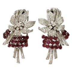 Pair of Platinum Diamond and Ruby Clip Brooches, circa 1950