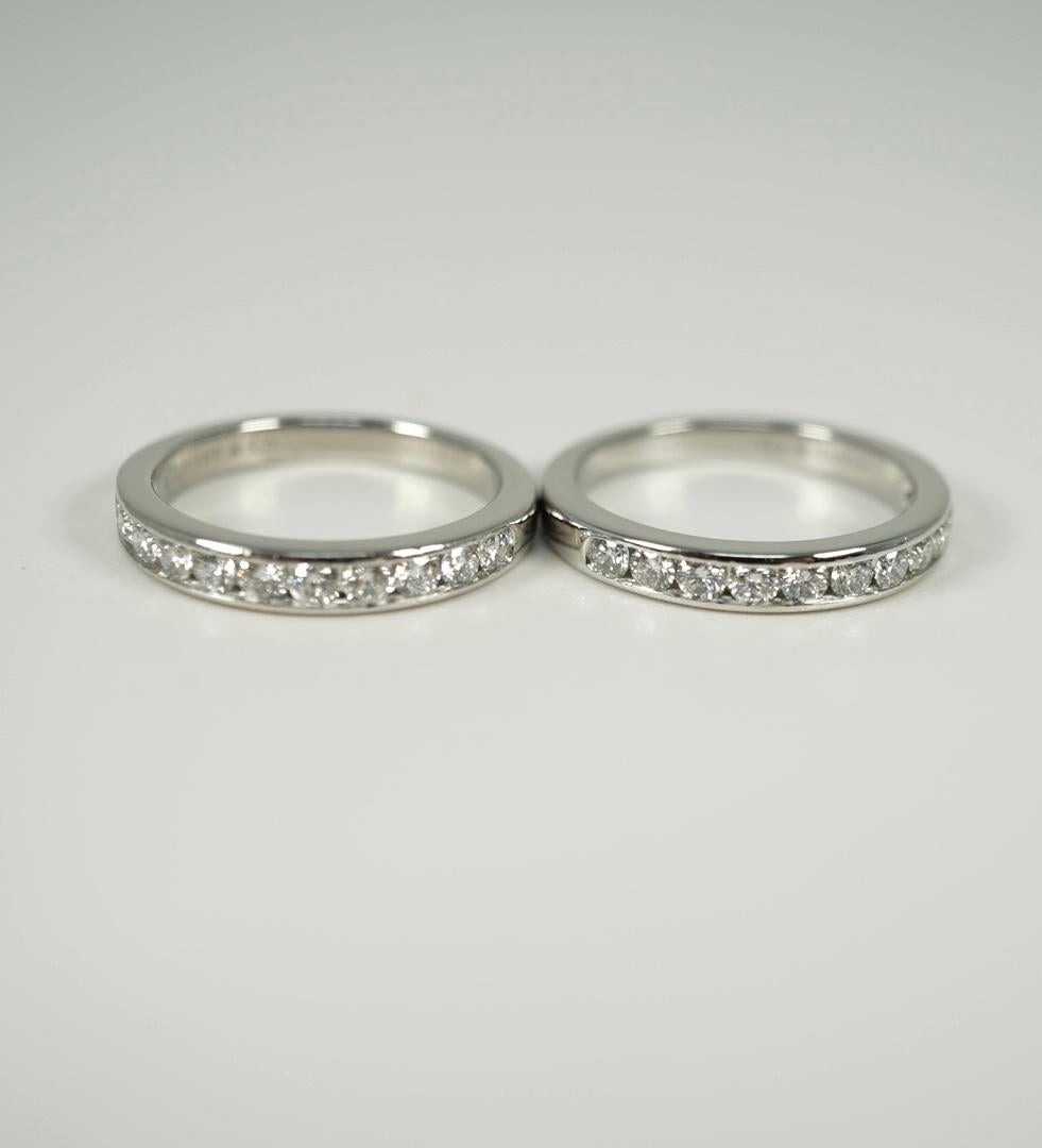 Round Cut Pair of Platinum Diamond Rings by Tiffany & Co.