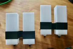 Pair of plexiglass and metal wall light