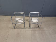 Pair of plexiglass and tubular chrome armchairs, 1970s