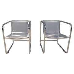 Pair of plexiglass and tubular chrome armchairs, 1970s
