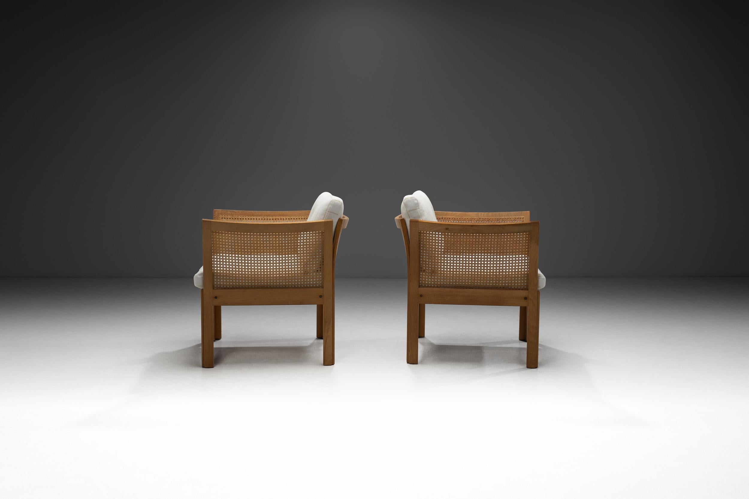 Danish Pair of “Plexus” Oak and Cane Easy Chairs by Illum Wikkelsø, Denmark circa 1970s For Sale