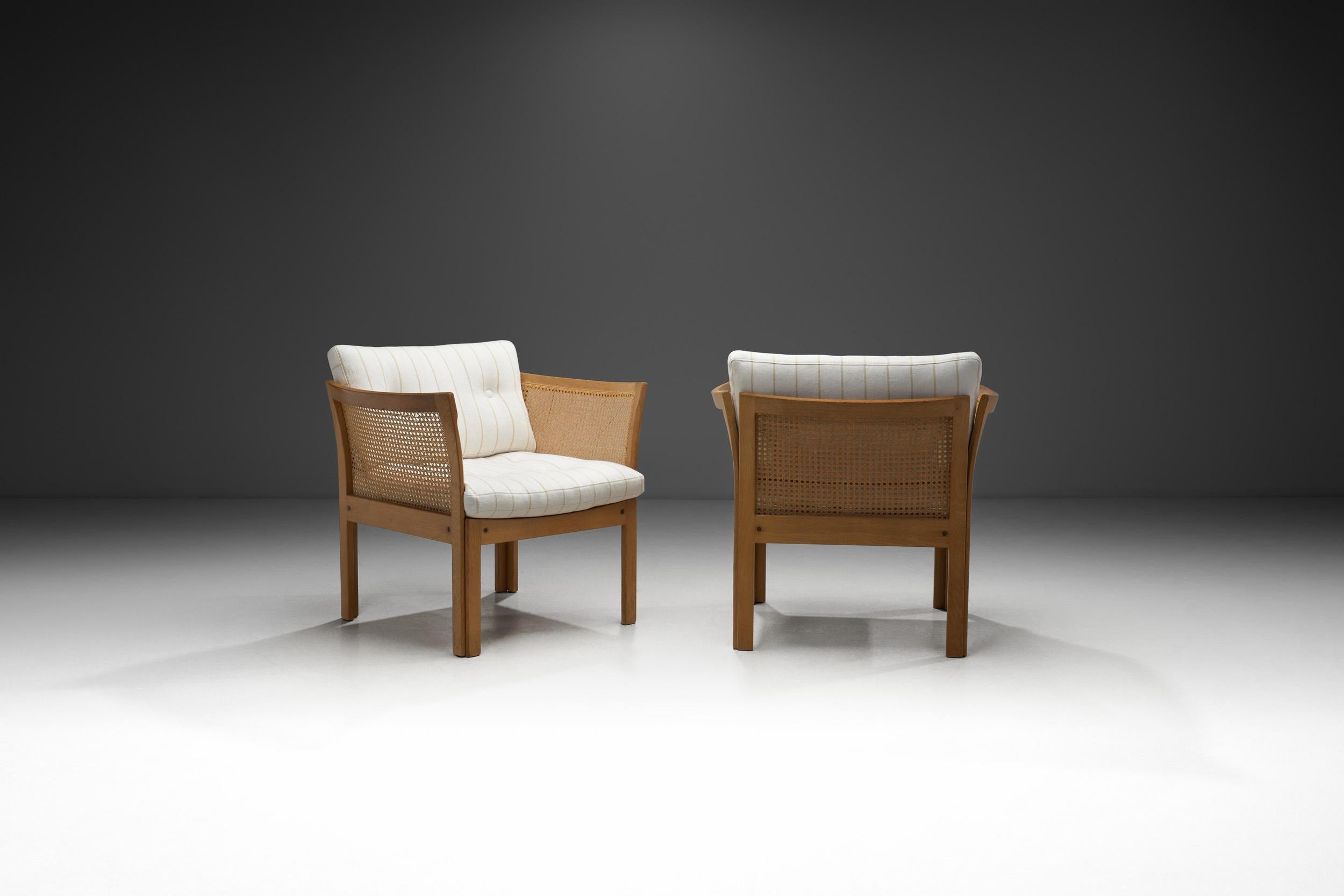 Pair of “Plexus” Oak and Cane Easy Chairs by Illum Wikkelsø, Denmark circa 1970s In Good Condition For Sale In Utrecht, NL