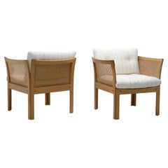Pair of “Plexus” Oak and Cane Easy Chairs by Illum Wikkelsø, Denmark circa 1970s