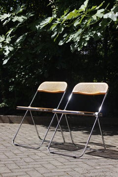 Pair of Plia cane chairs designed by Giancarlo Piretti for Castelli, 1970s