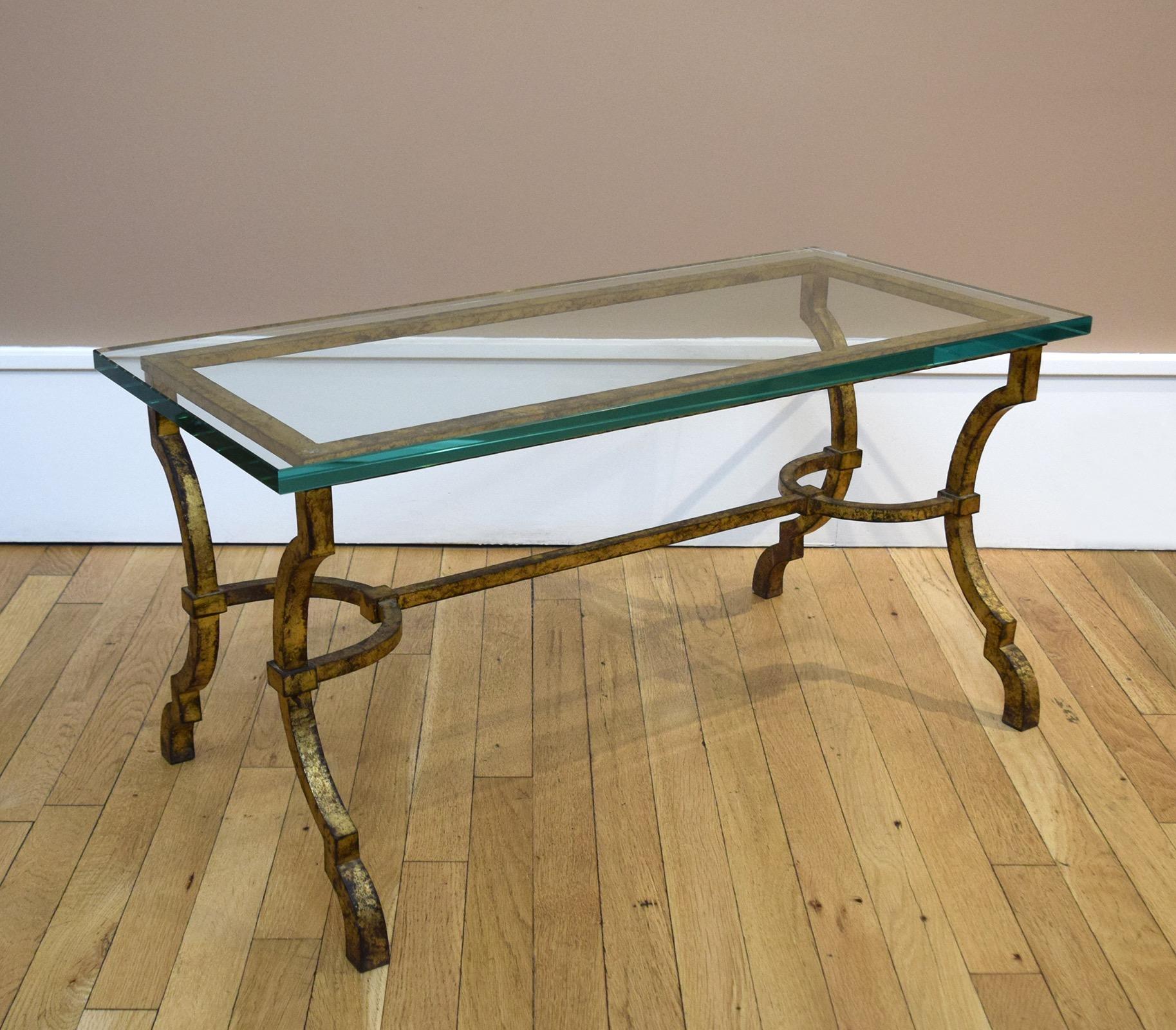Around 1950 Gilbert Poillerat, the finest metalworker of his day, began supplying the Paris decorating firm of Ramsay with a small line of gilded-wrought-iron tables and standing lamps. Poillerat was then working in an updated Baroque style,
