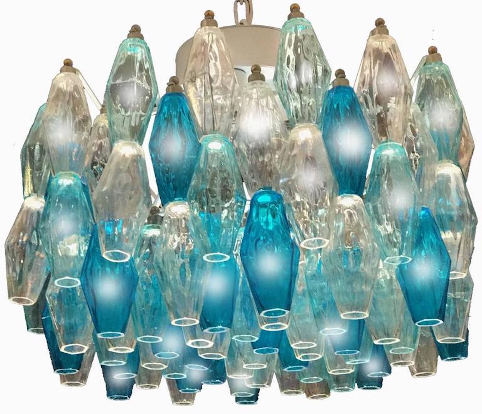 Each chandelier consists of 96-colored Poliedri of Murano. Ice, heavenly and acquamarina. Height lights, without chain 40 cm. Edition limited from a great master of Venetian glass.
  