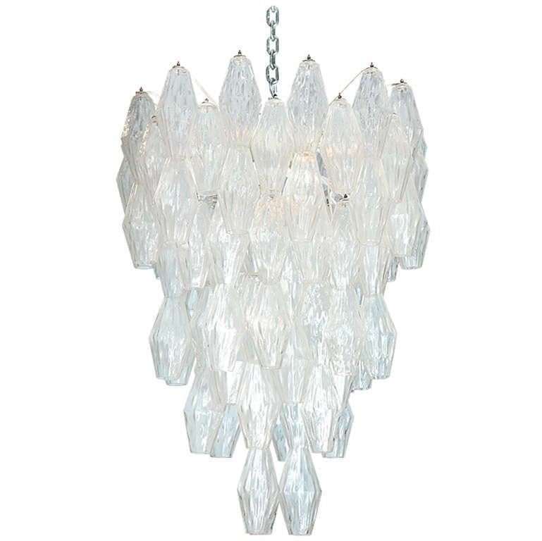 Pair of Poliedri Hanging Fixtures by Venini.  Designed by Paolo Venini and originally introduced in 1957. Beautiful and large fixture with textured blown glass. Abstract diamond forms with faceted sides hanging from multi-armed interior frame, with
