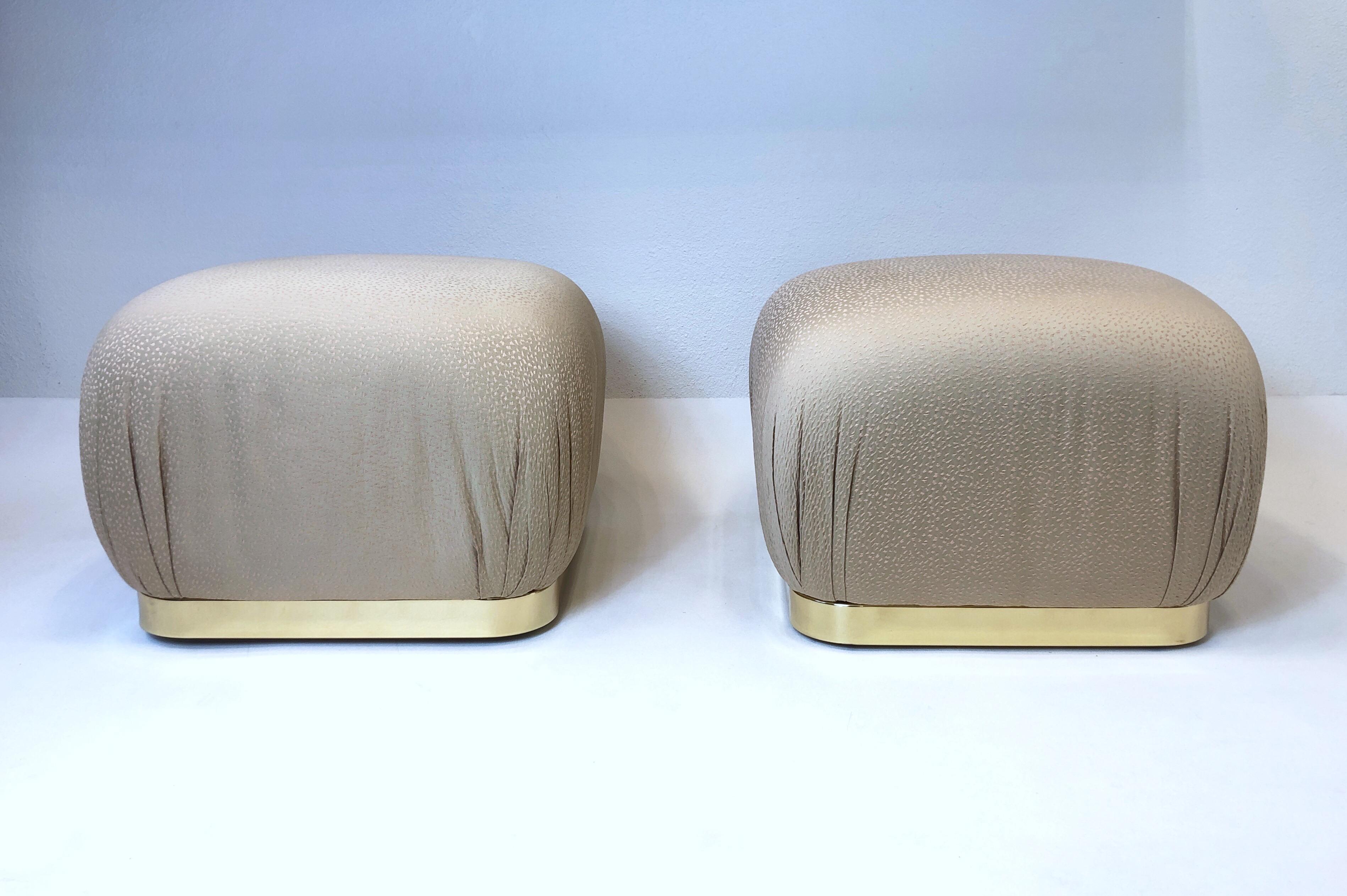 Glamorous pair of polish brass and fabric on casters poufs by Weiman Company.
This came out of a Steve Chase design estate and are in beautiful original condition.
Measurements: 23” Wide 23” Deep 17” High.