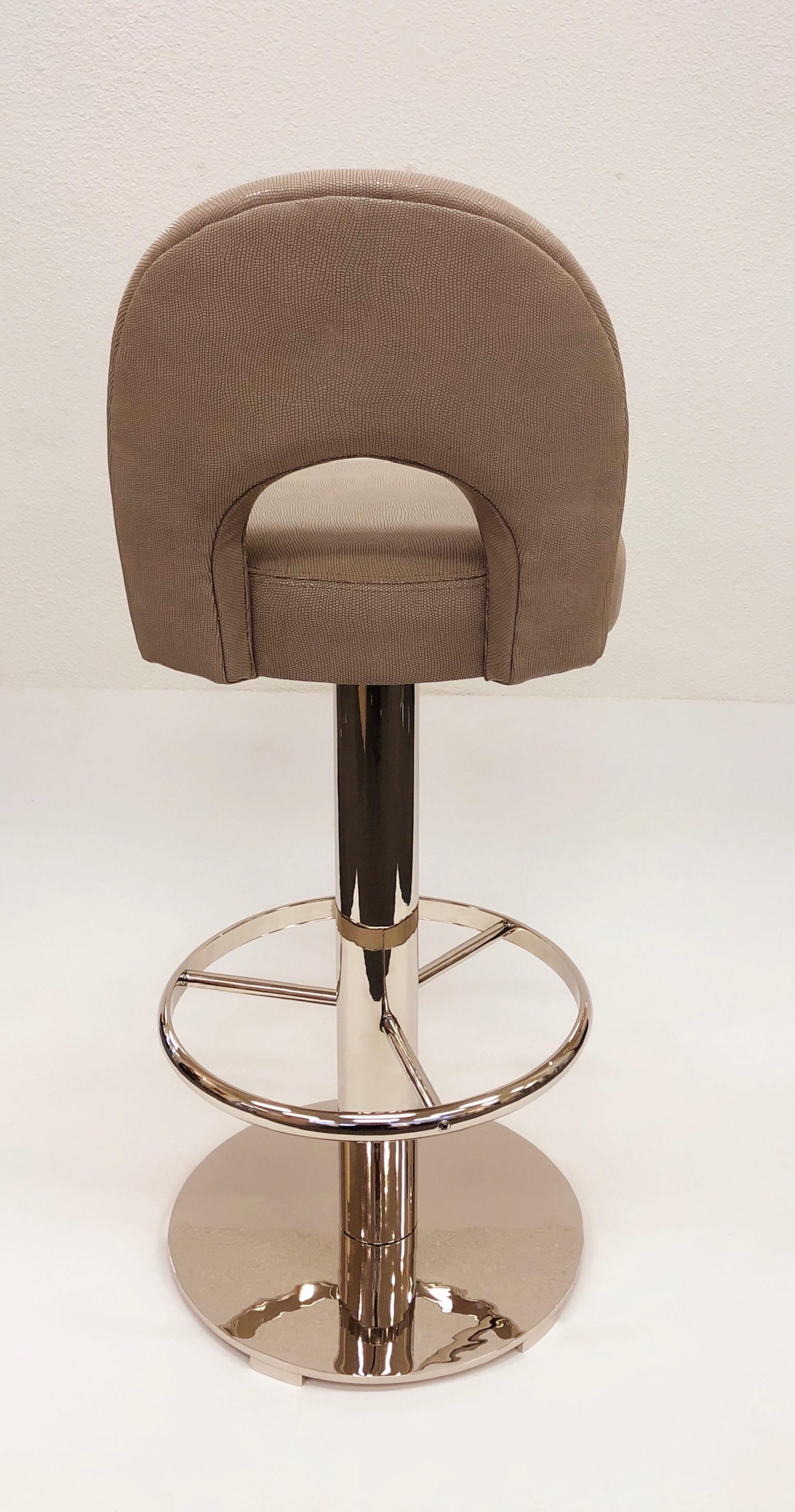 Embossed Pair of Polish Nickel and Leather Swivel Bar Stools by Charles Hollis Jones