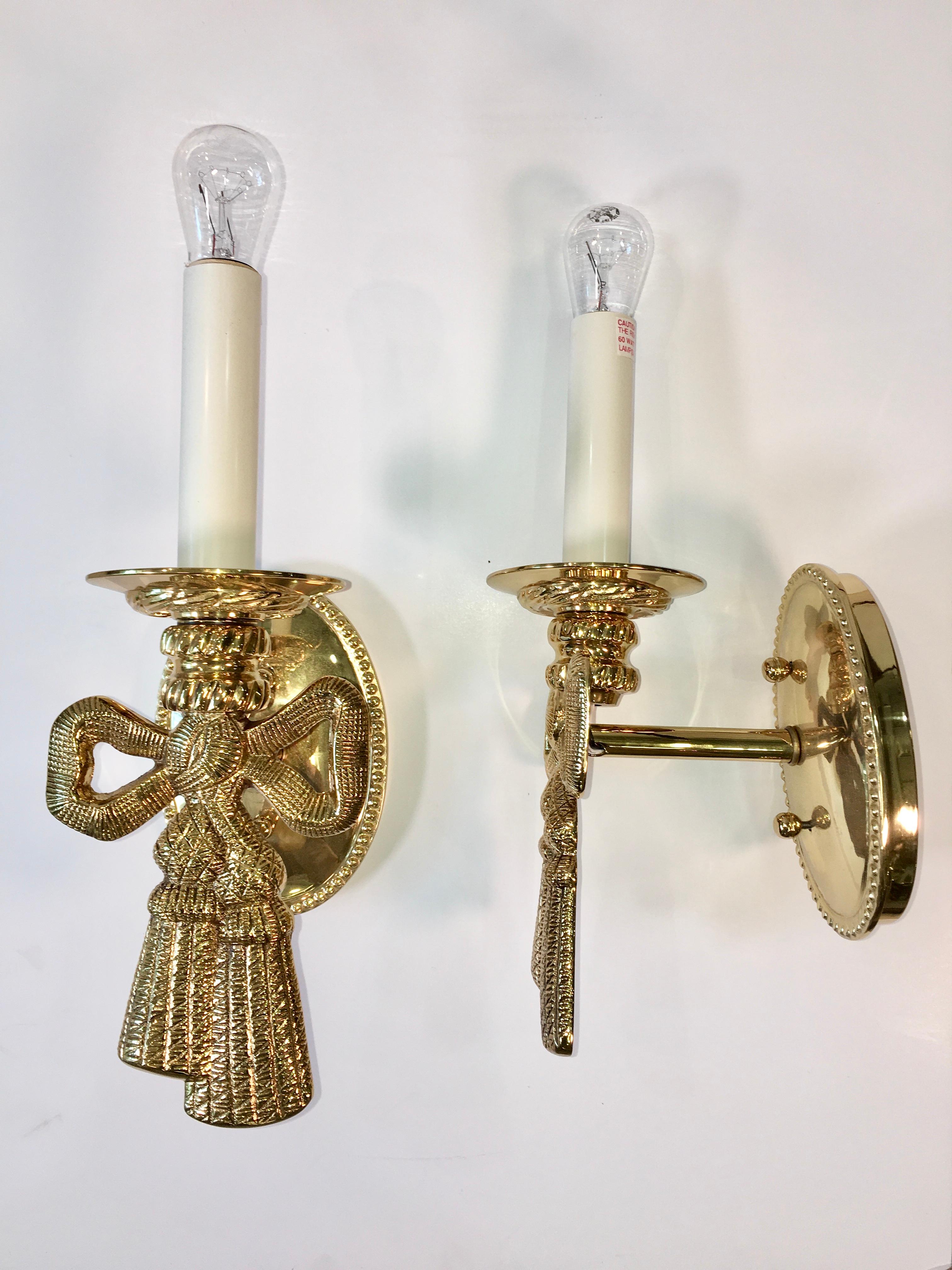 American Pair of Polished Brass Bow Sconces For Sale