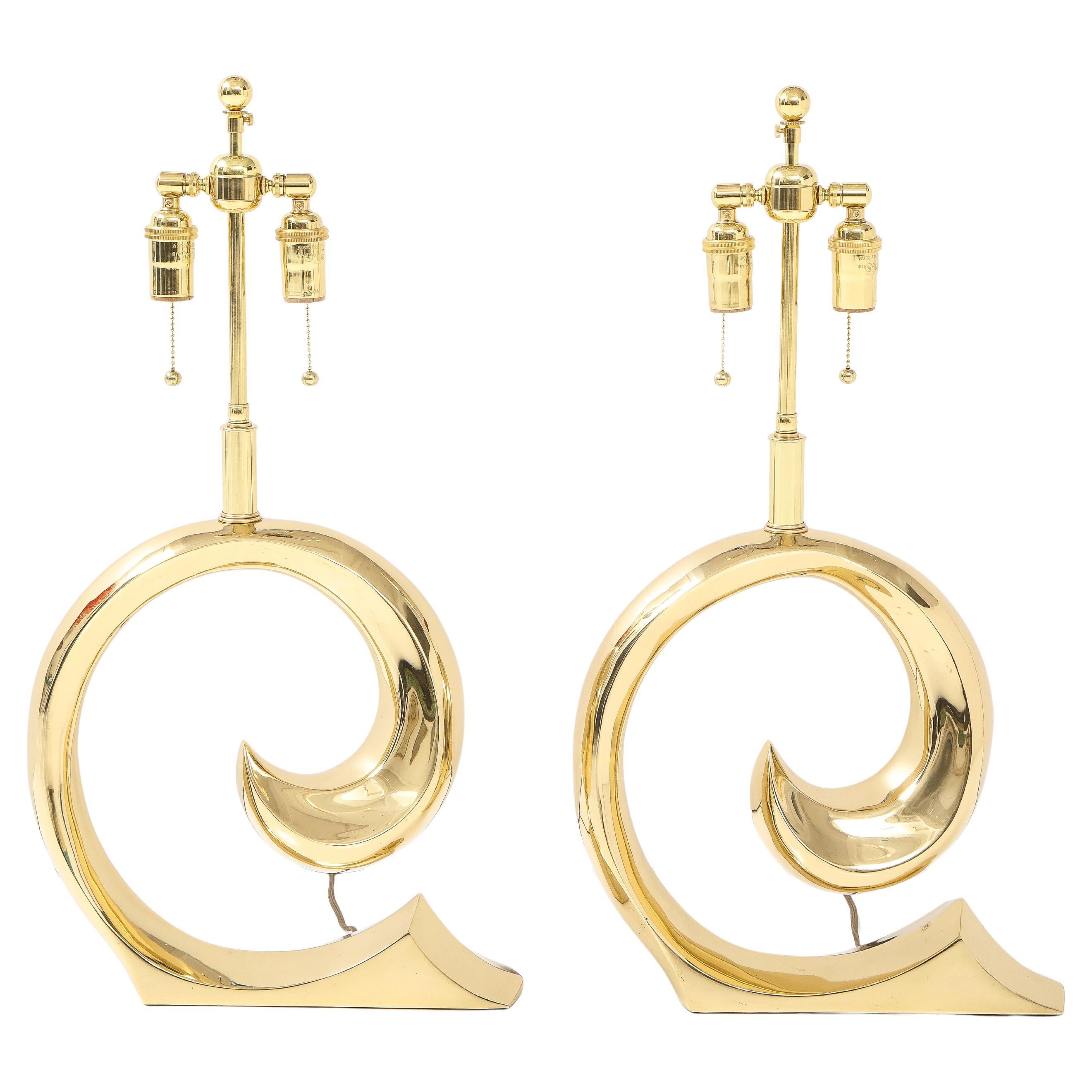 Pair of polished Brass Pierre Cardin Logo Lamps by Erwin Lambeth For Sale
