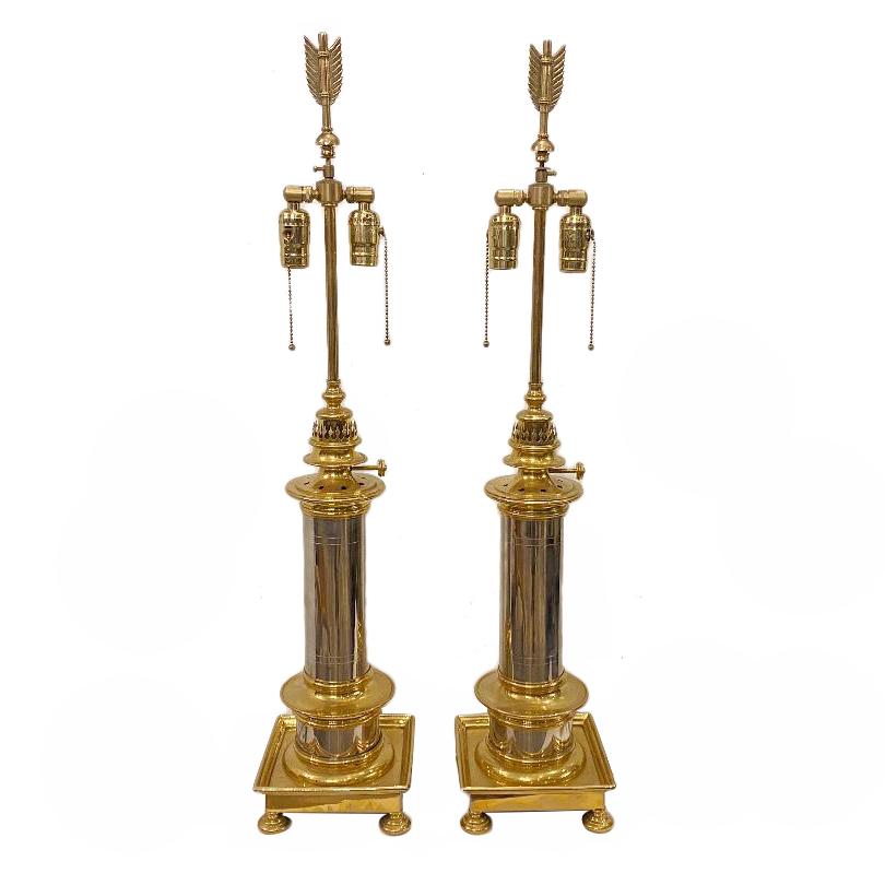 A pair of circa 1940s French polished bronze and nickel table lamps.

Measurements:
Height of body 21