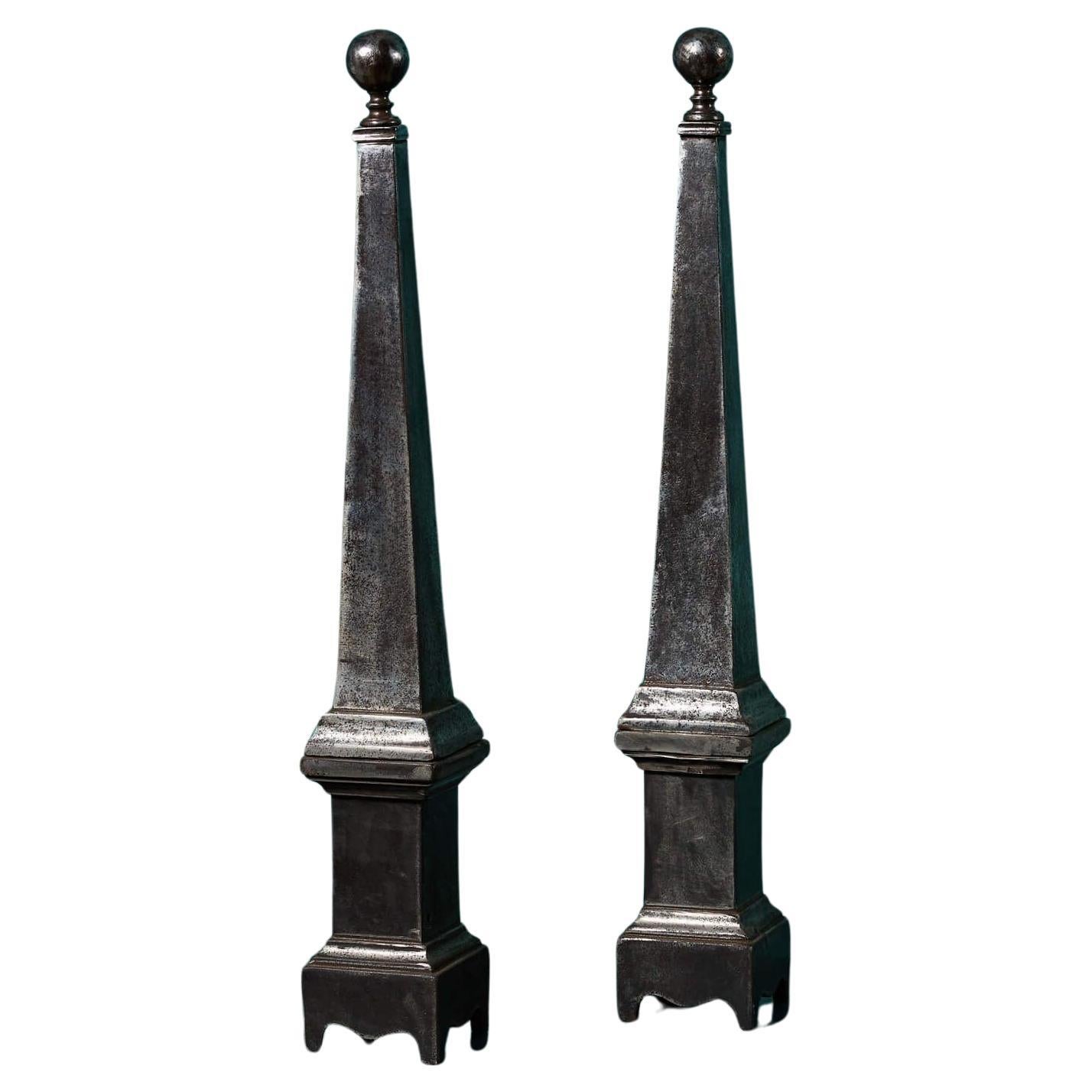 Pair of Polished Cast Iron Obelisks