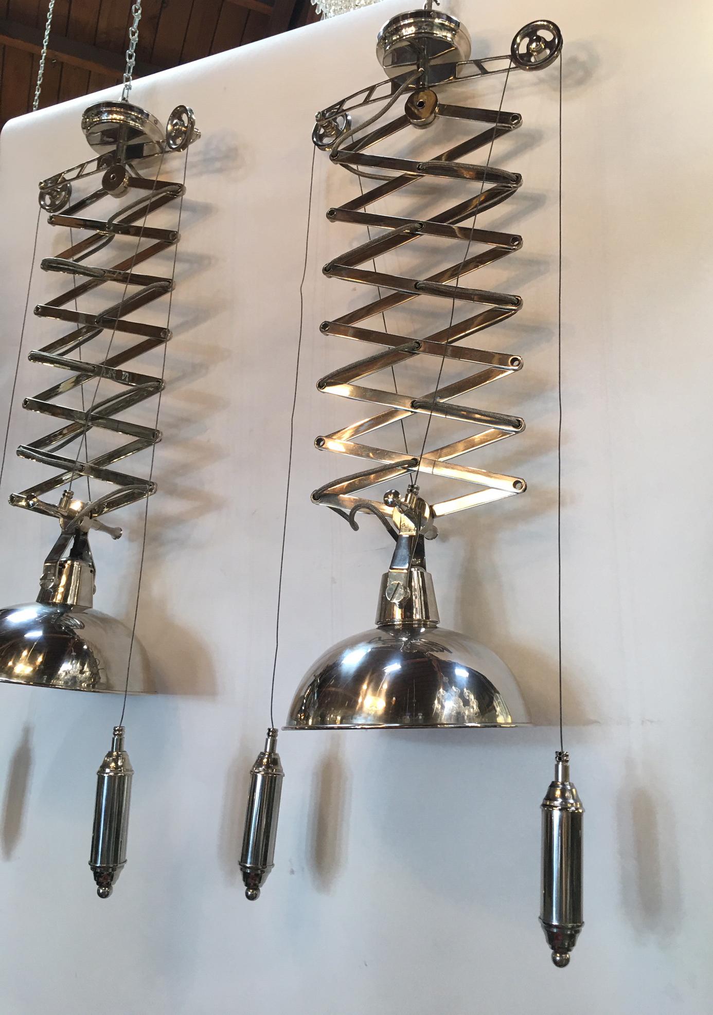 Contemporary Pair of Polished Chrome Accordion Pendants