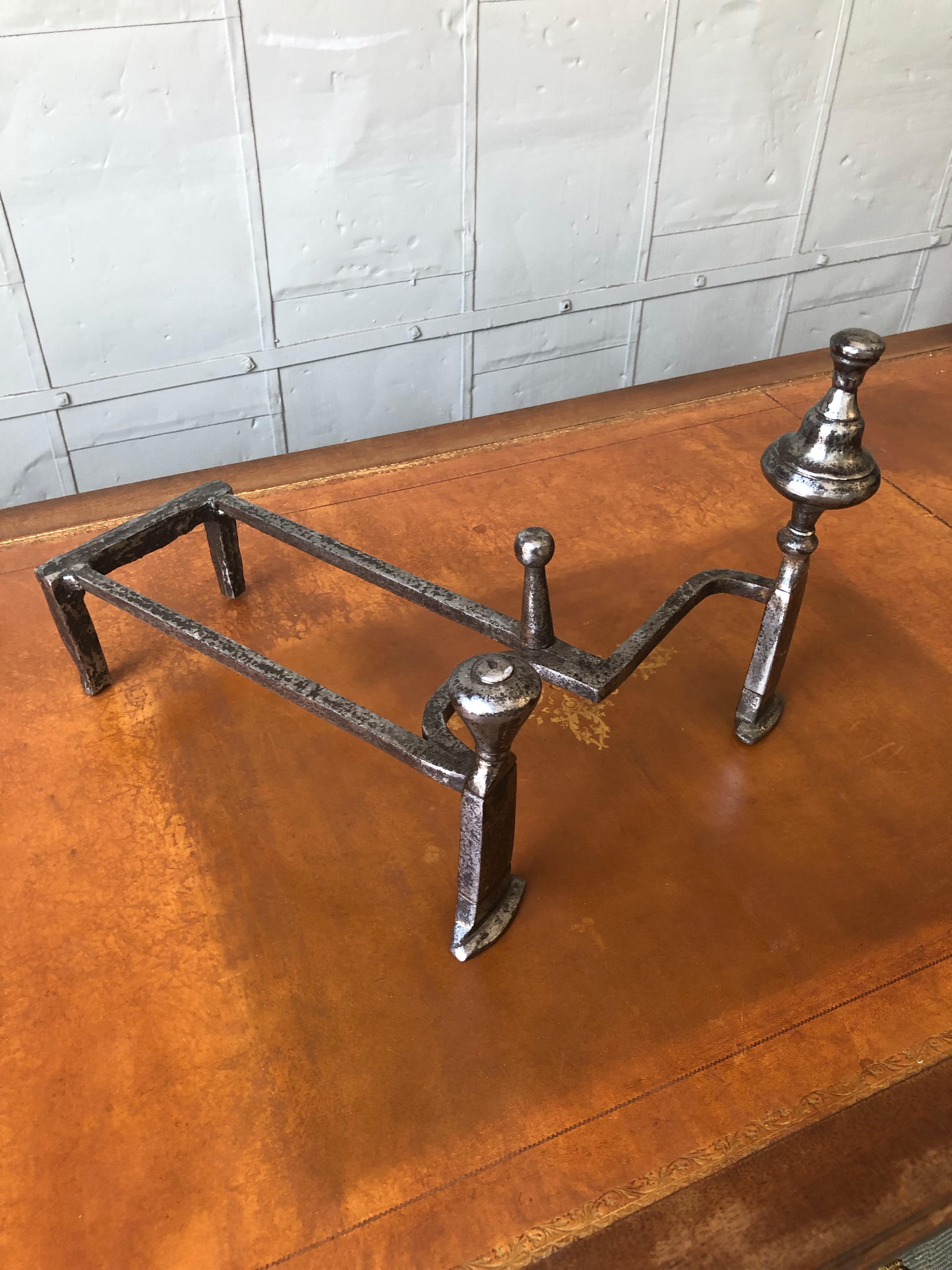 Early 20th Century Pair of Polished Iron Andirons in the Art Deco Style For Sale