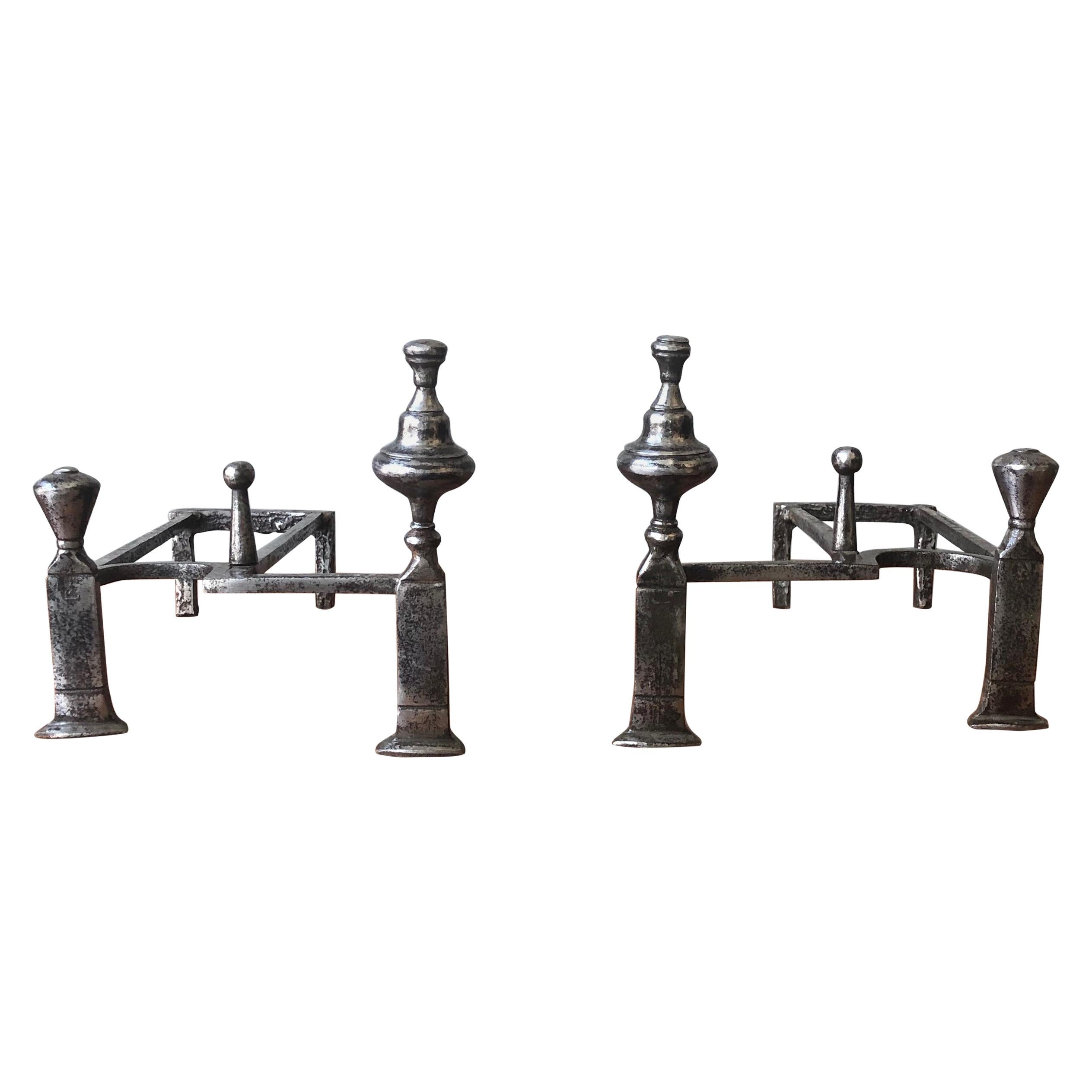 Pair of Polished Iron Andirons in the Art Deco Style For Sale