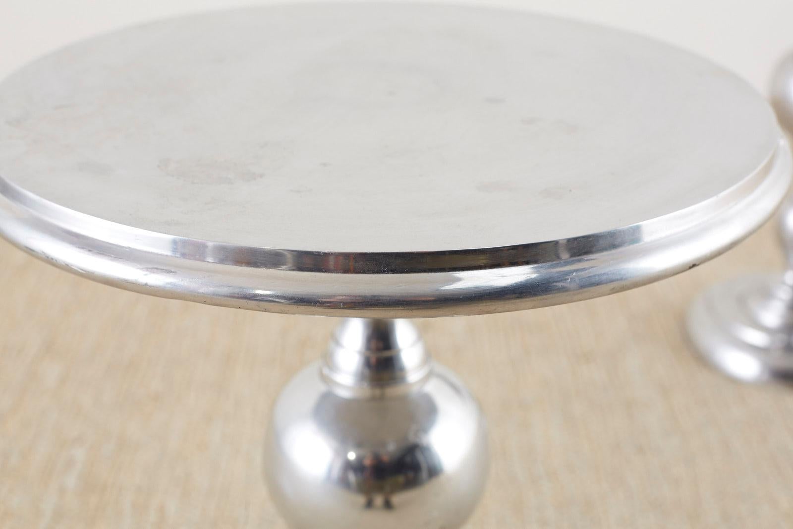 20th Century Pair of Polished Metal Round Pedestal Drink Tables