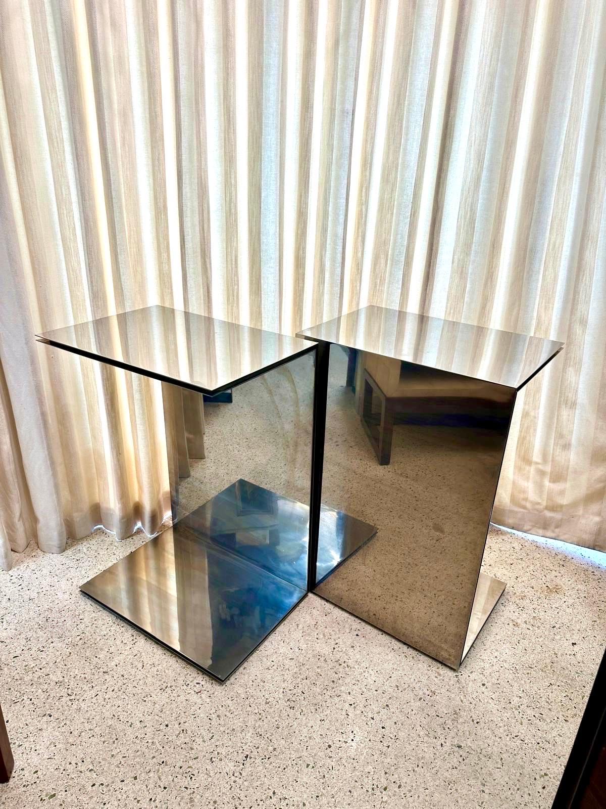 This very heavy and sculptural pair of polished steel display pedestals have SO MANY uses for art pieces, sculpture, etc.

NOTE: 3/4 inch thick steel