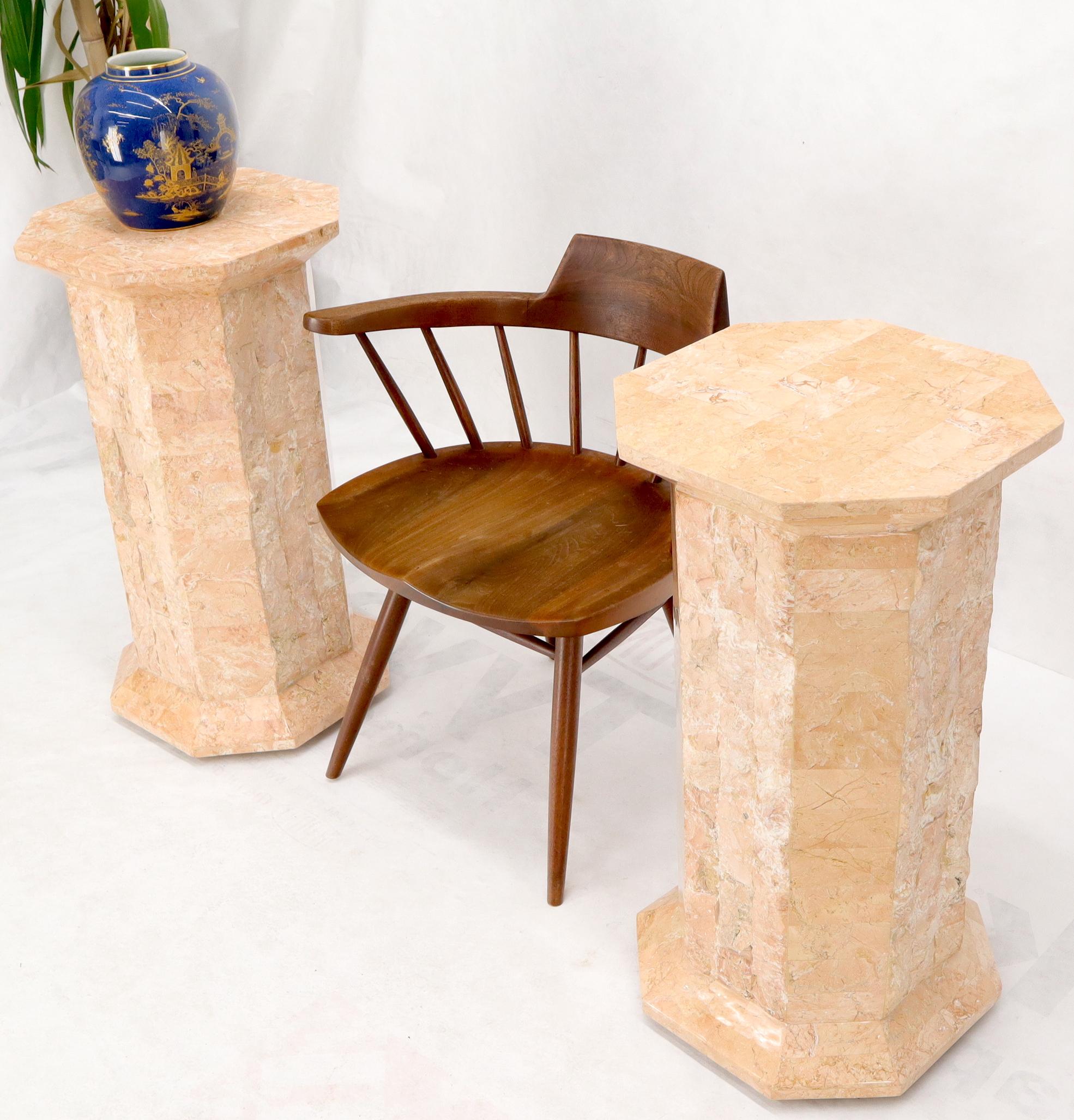 Pair of Mid-Century Modern tessellated red and white stone octagon shape carved sides pedestals.