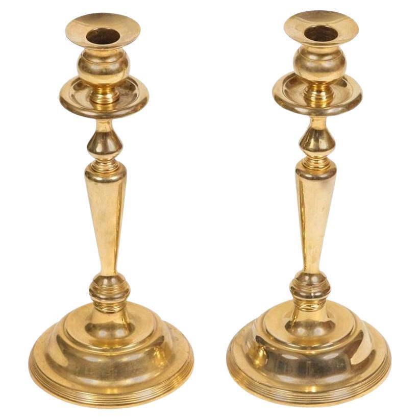 Pair of Polished Victorian Brass Candlesticks For Sale