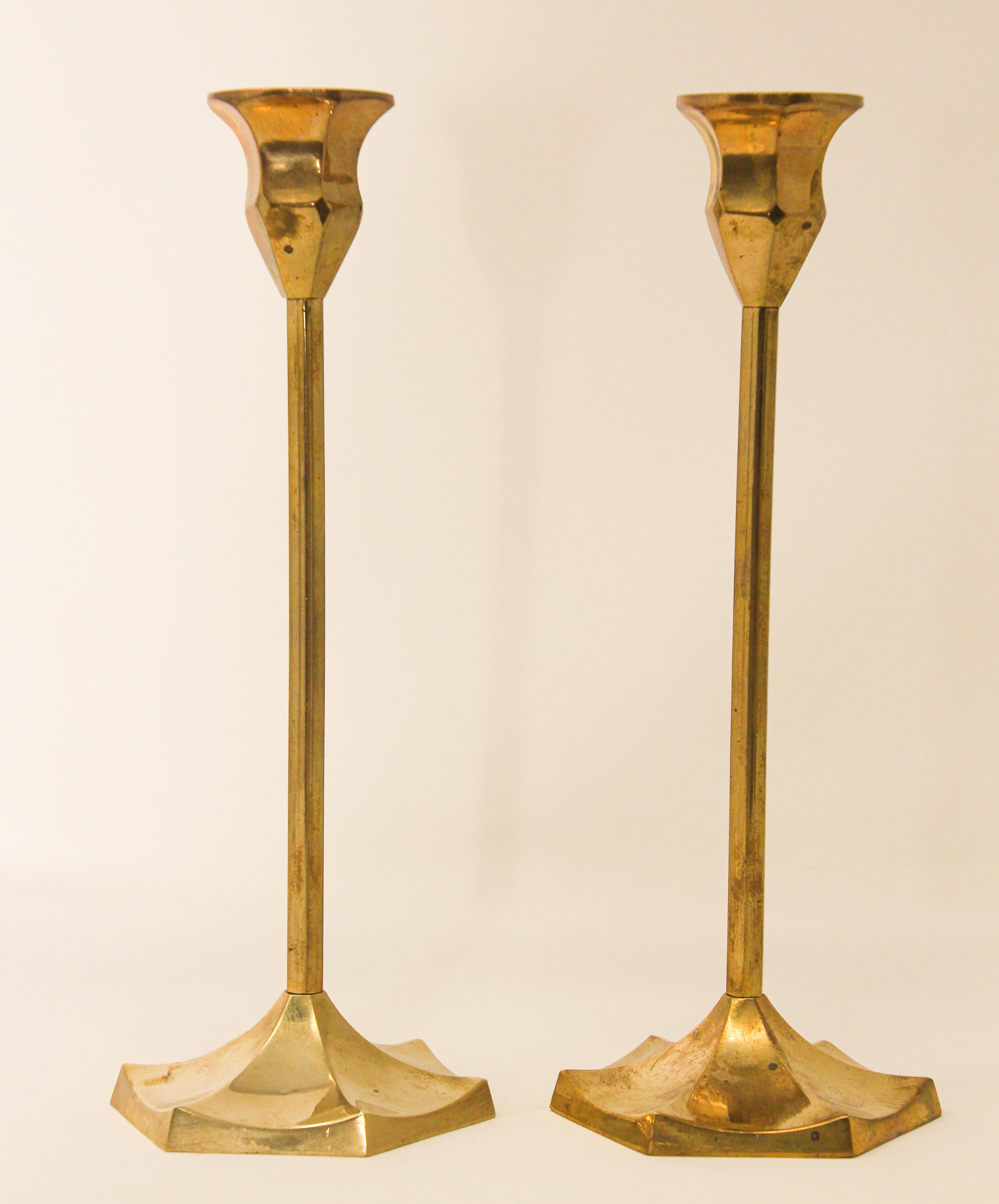 Cast Pair of Polished Vintage Swedish Brass Candlesticks For Sale
