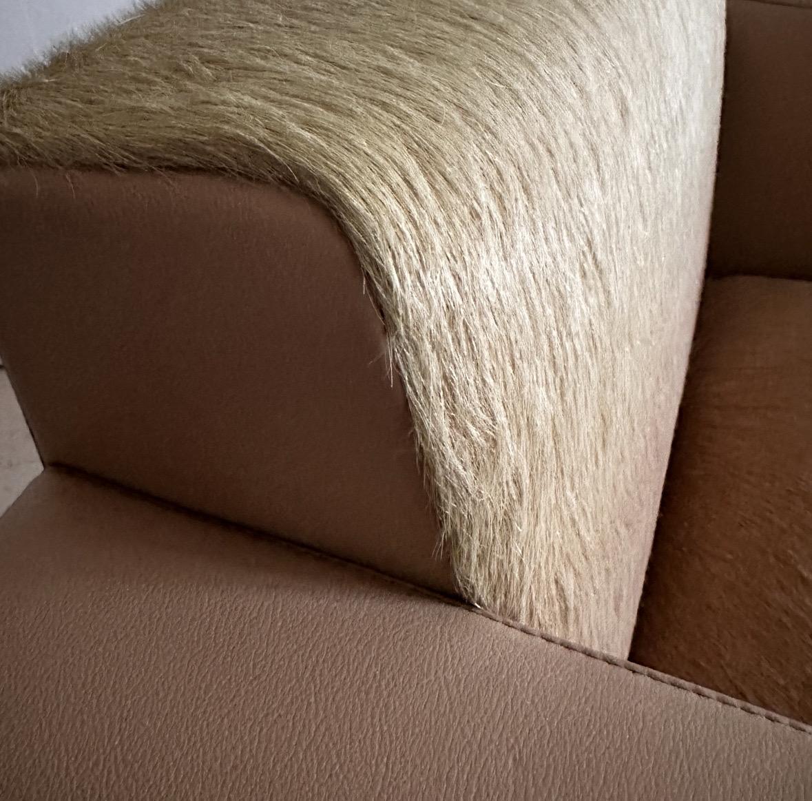 Exceptional craftsmanship as Poltrona Frau is known for, extremely soft leather, and custom ordered ‘cowhide’ for a subtle and luxurious texture. The original retail would be somewhere around 5800 each chair. These are offered as a pair, lightly