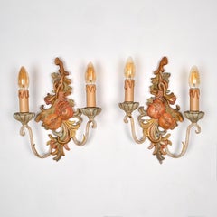Pair of polychrome carved wood and metal wall lights by Chelini, Firenze, 1980