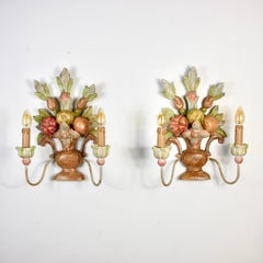 Pair of polychrome carved wood sconces from Italy, 1920s