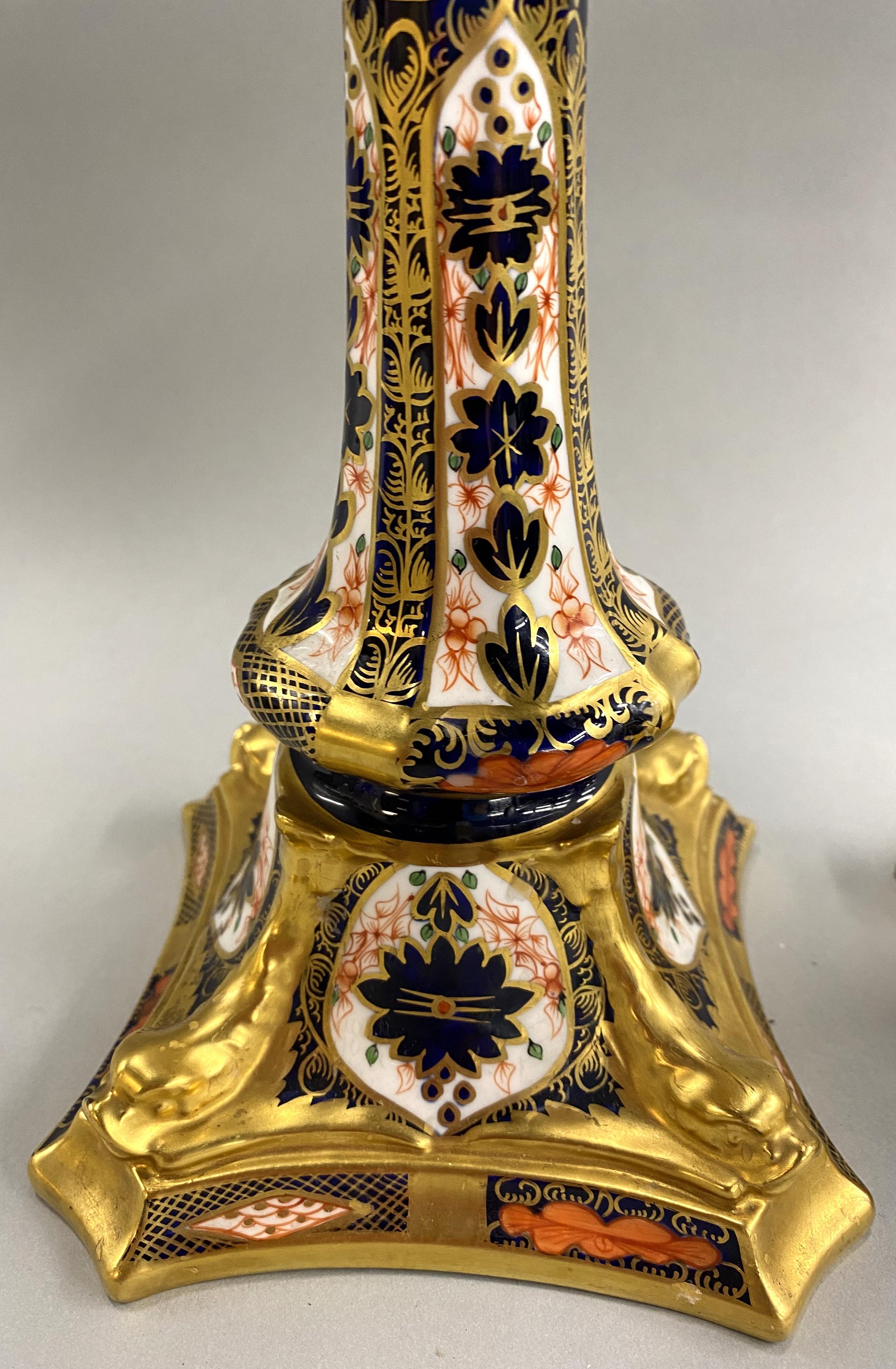 Mid-20th Century Pair of Polychrome Old Imari Royal Crown Derby Porcelain Dolphin Candlesticks For Sale