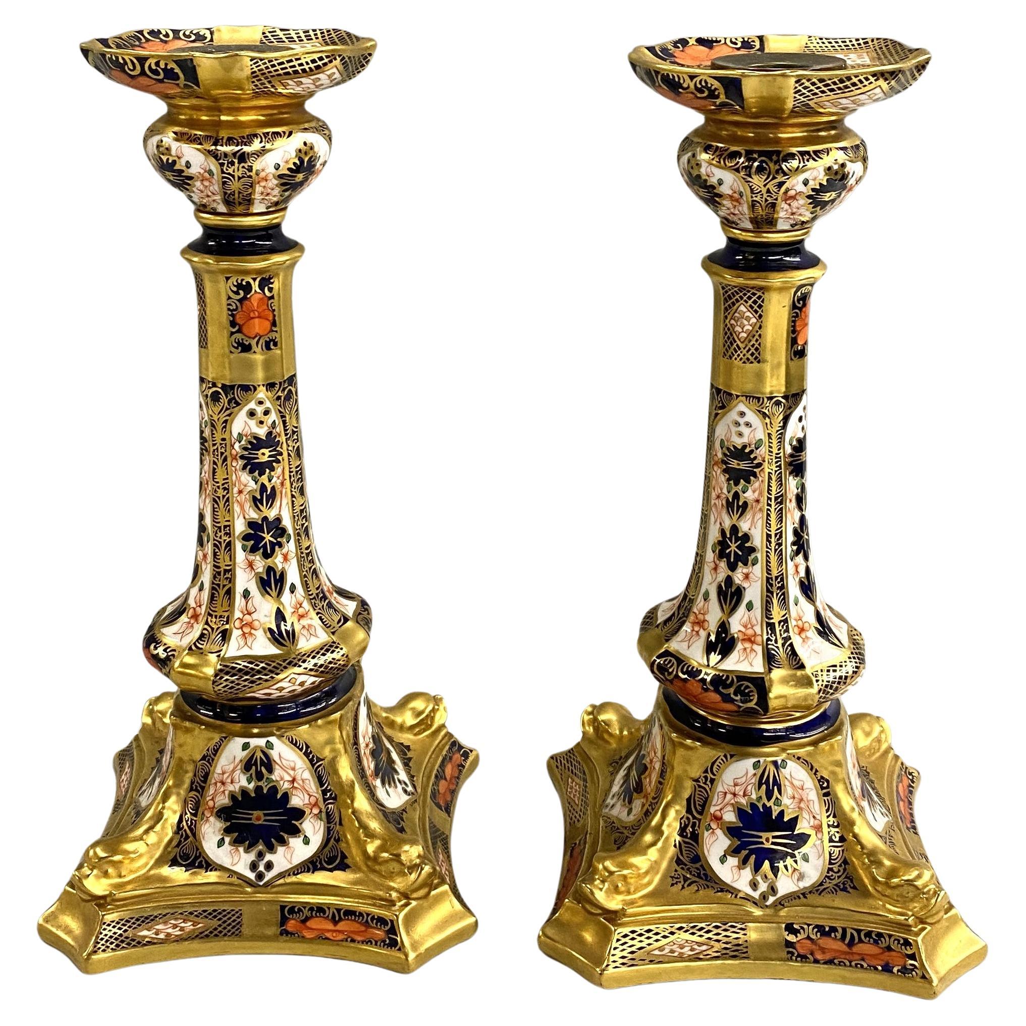 Pair of Polychrome Old Imari Royal Crown Derby Porcelain Dolphin Candlesticks For Sale