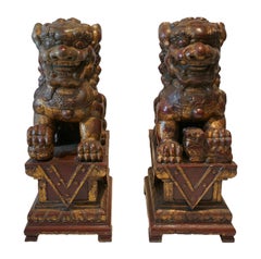 Pair of polychrome wooden Foodogs, Qilin, China 19th century