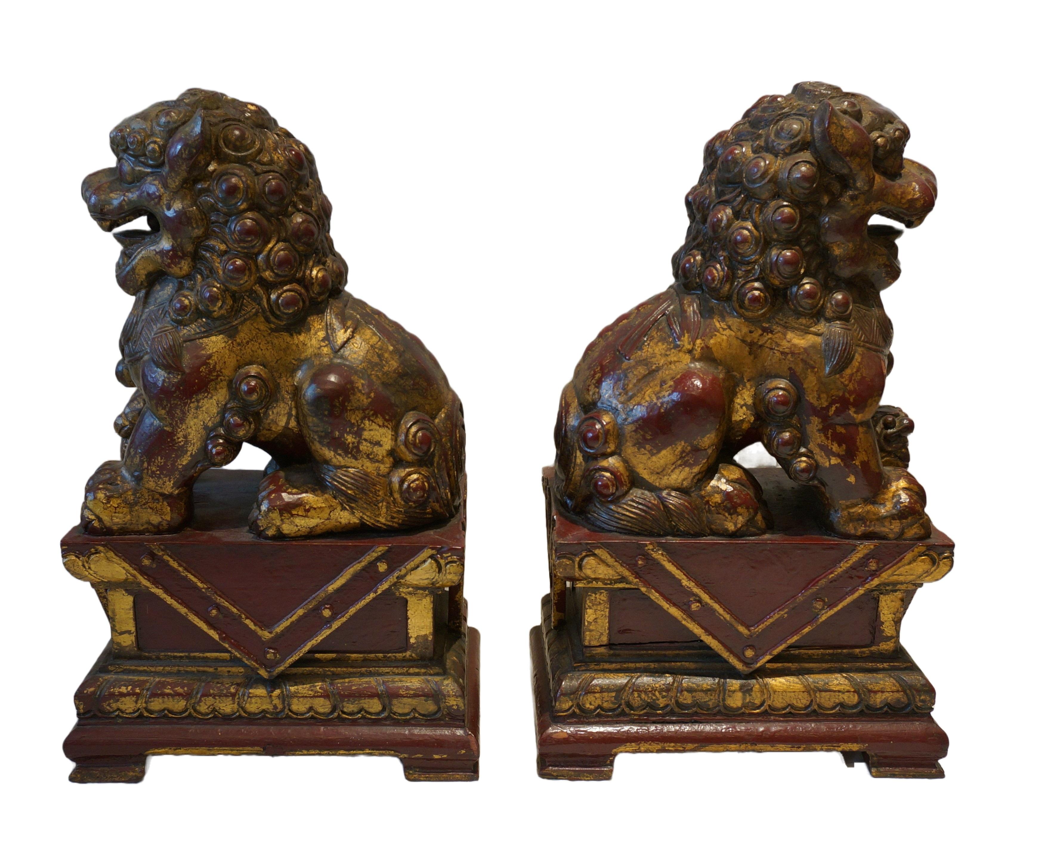 Chinese Pair of polychrome wooden Foodogs, Qilin, China 19th century