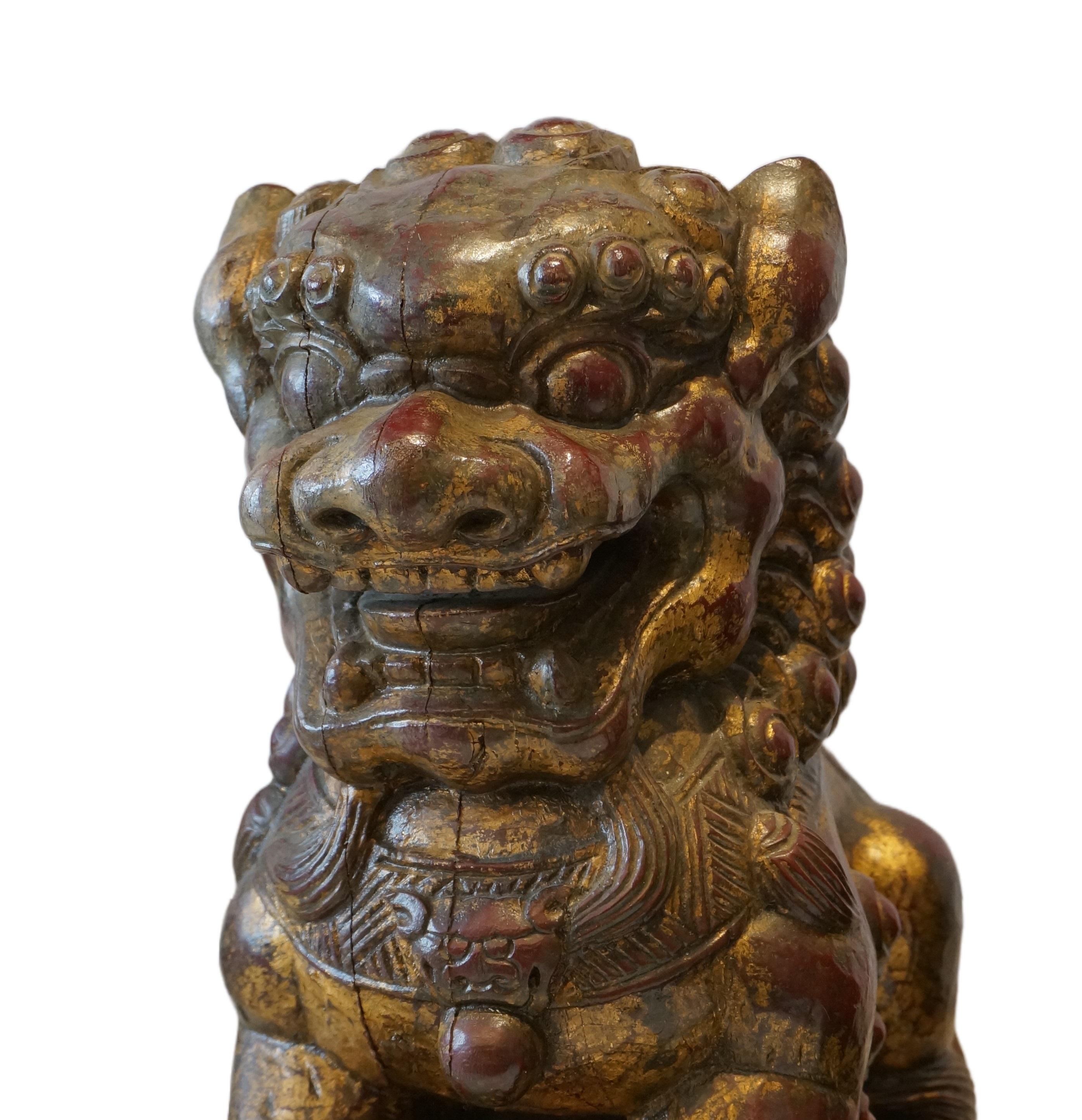 19th Century Pair of polychrome wooden Foodogs, Qilin, China 19th century