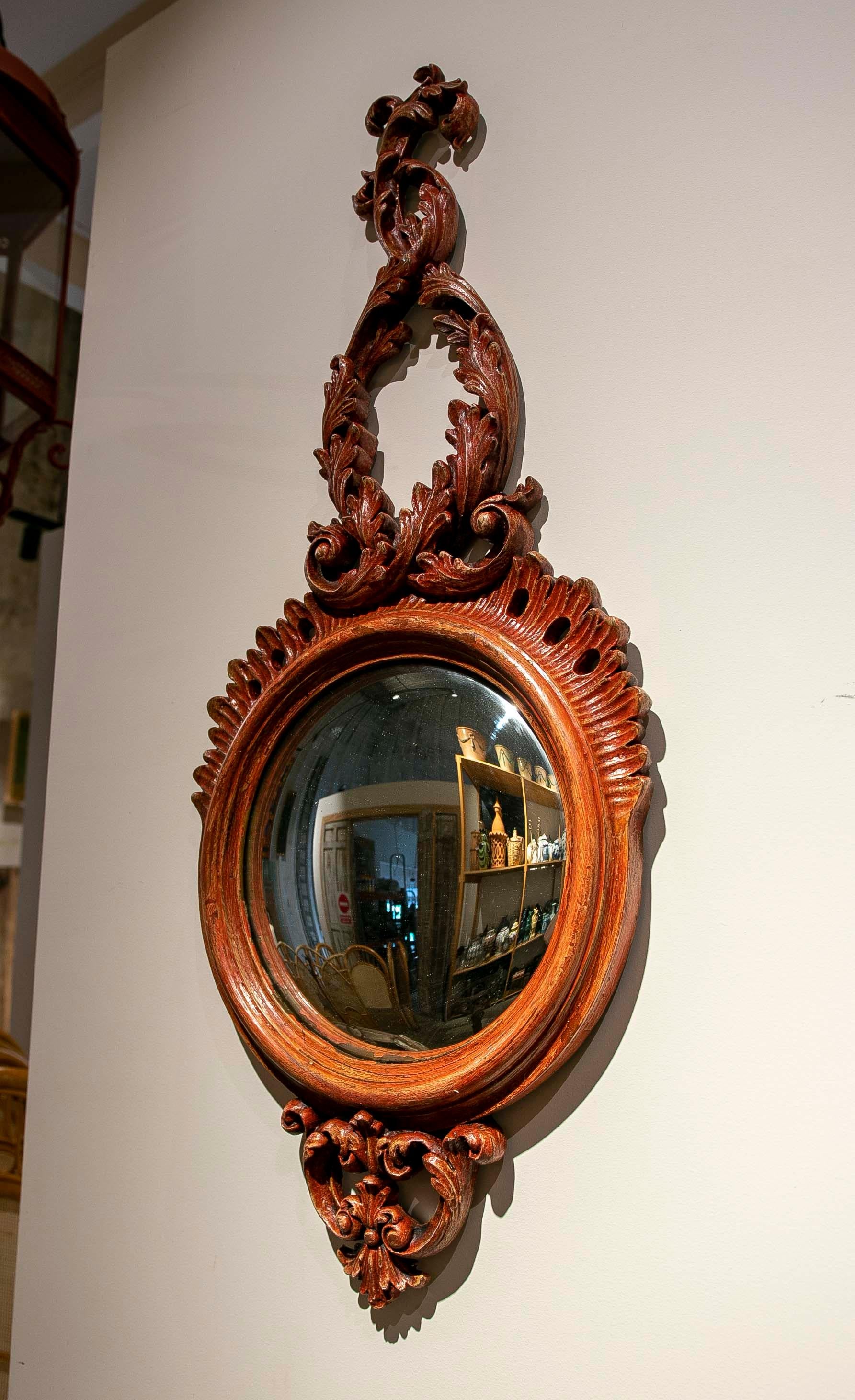 Pair of Polychromed Rounds Wall Mirrors in Shades of Red.