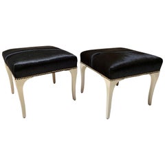 Pair of Pony Skin Ottomans, Sabre Legs with Lacquered Finish