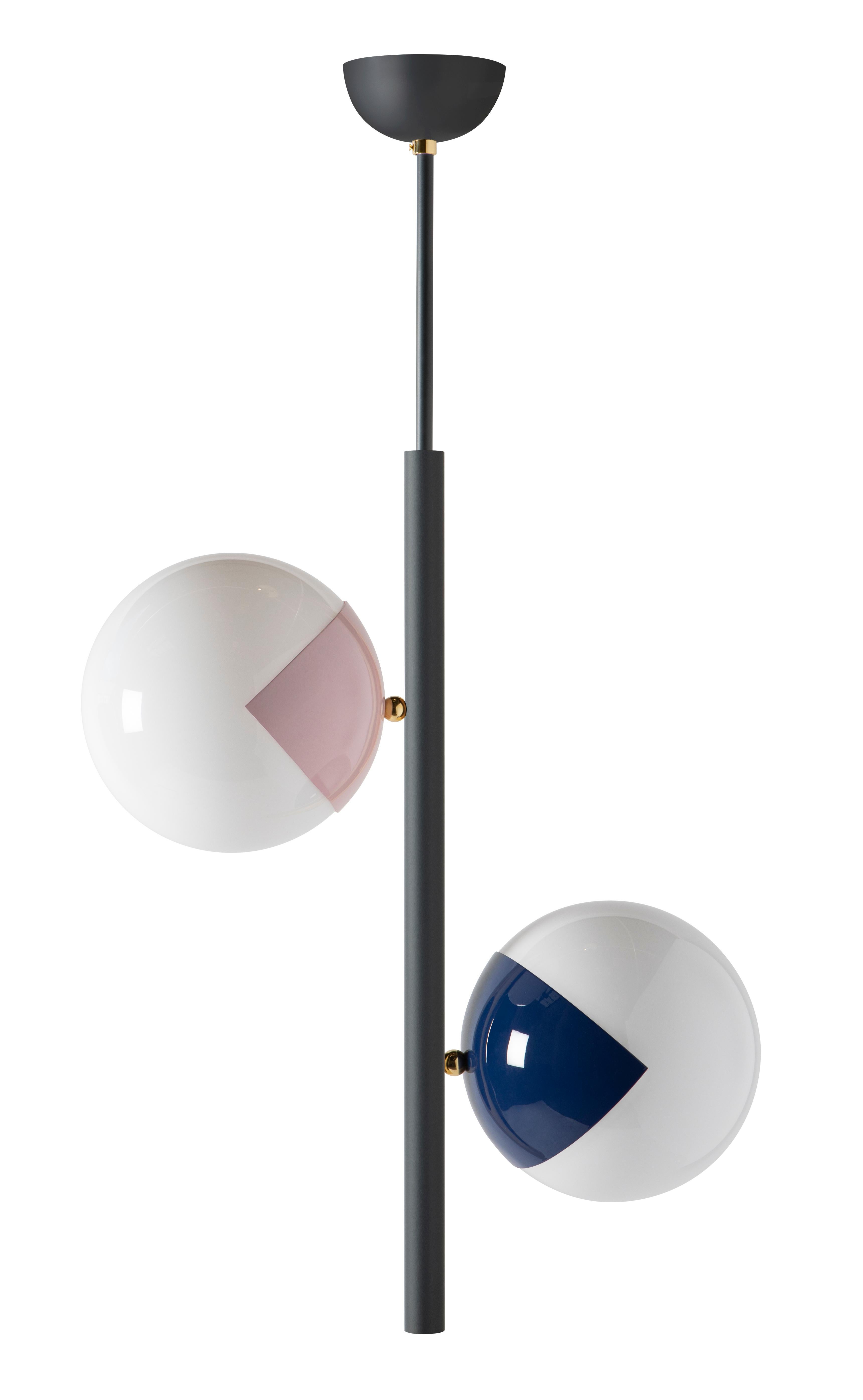 Pair of pop up chandeliers 135 by Magic Circus Editions.
Dimensions: W 58 x H 135 cm.
 Measure: diameter sphere 25 cm.
Materials: smooth brass and glossy mouth blown glass.

Available finishes: brass, nickel, matte black tube and brass, matte
