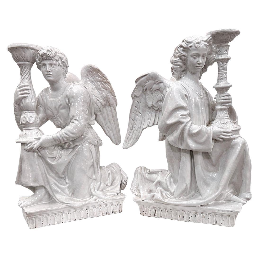 Pair of Porcelain Angel candlesticks