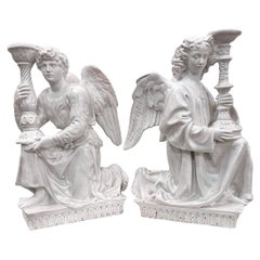 Pair of Porcelain Angel candlesticks
