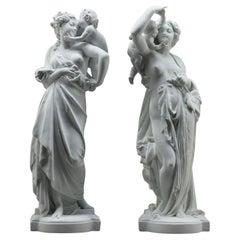 Pair of porcelain biscuit sculptures, after Carrier-Belleuse
