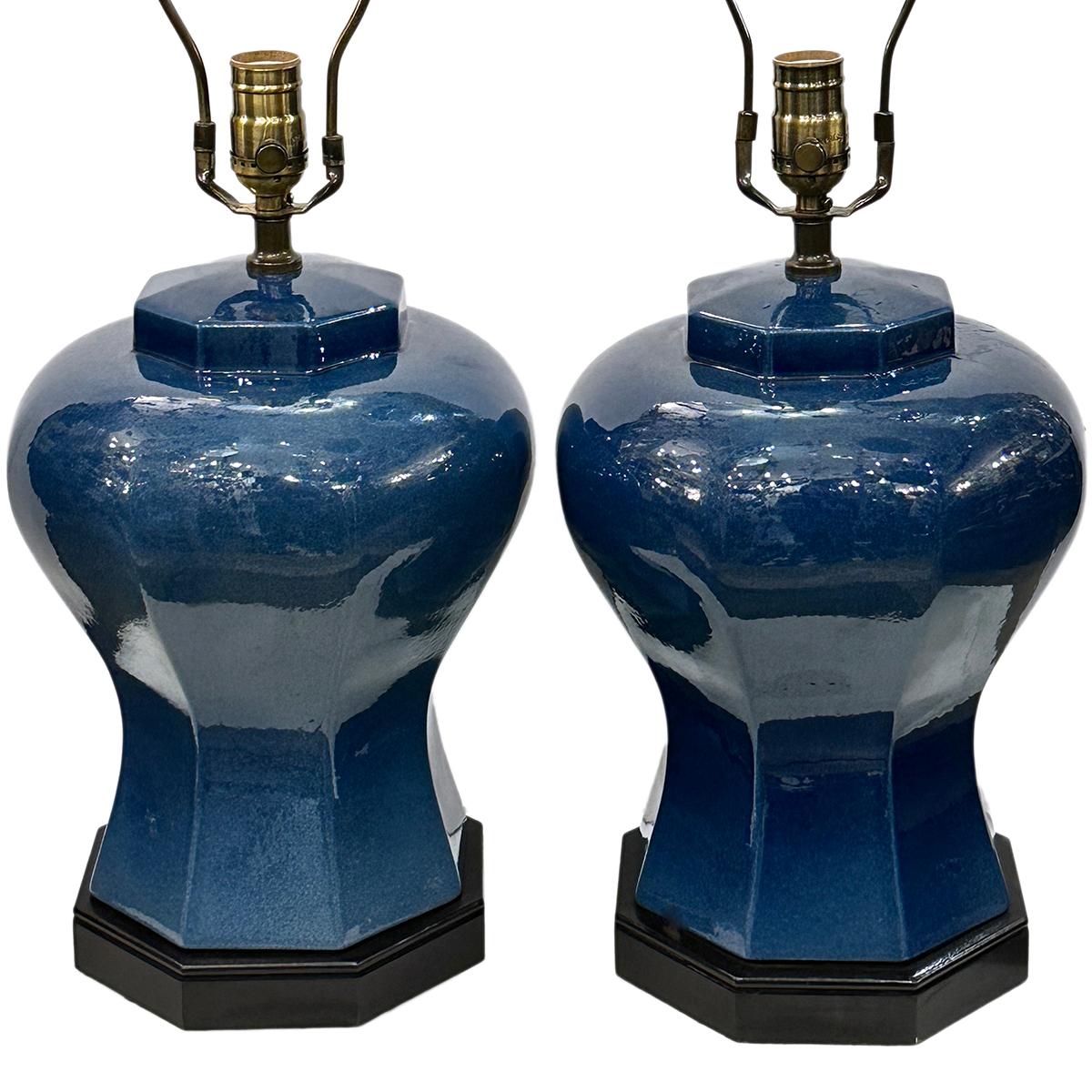 Pair of circa 1960's French porcelain blue lamps.

Measurements:
Height of body: 14