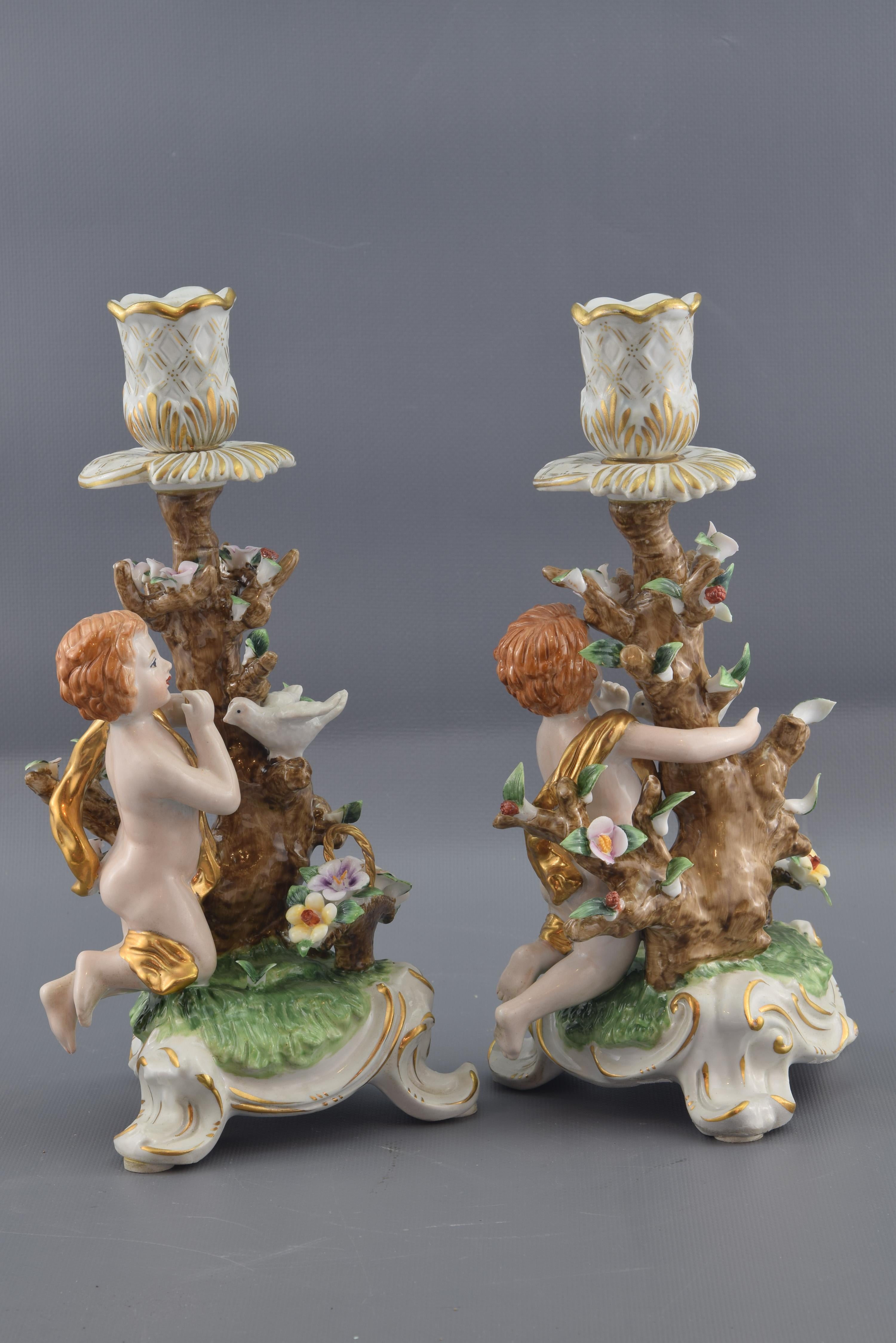 European Pair of Porcelain Candleholders, after Models from Sèvres, France