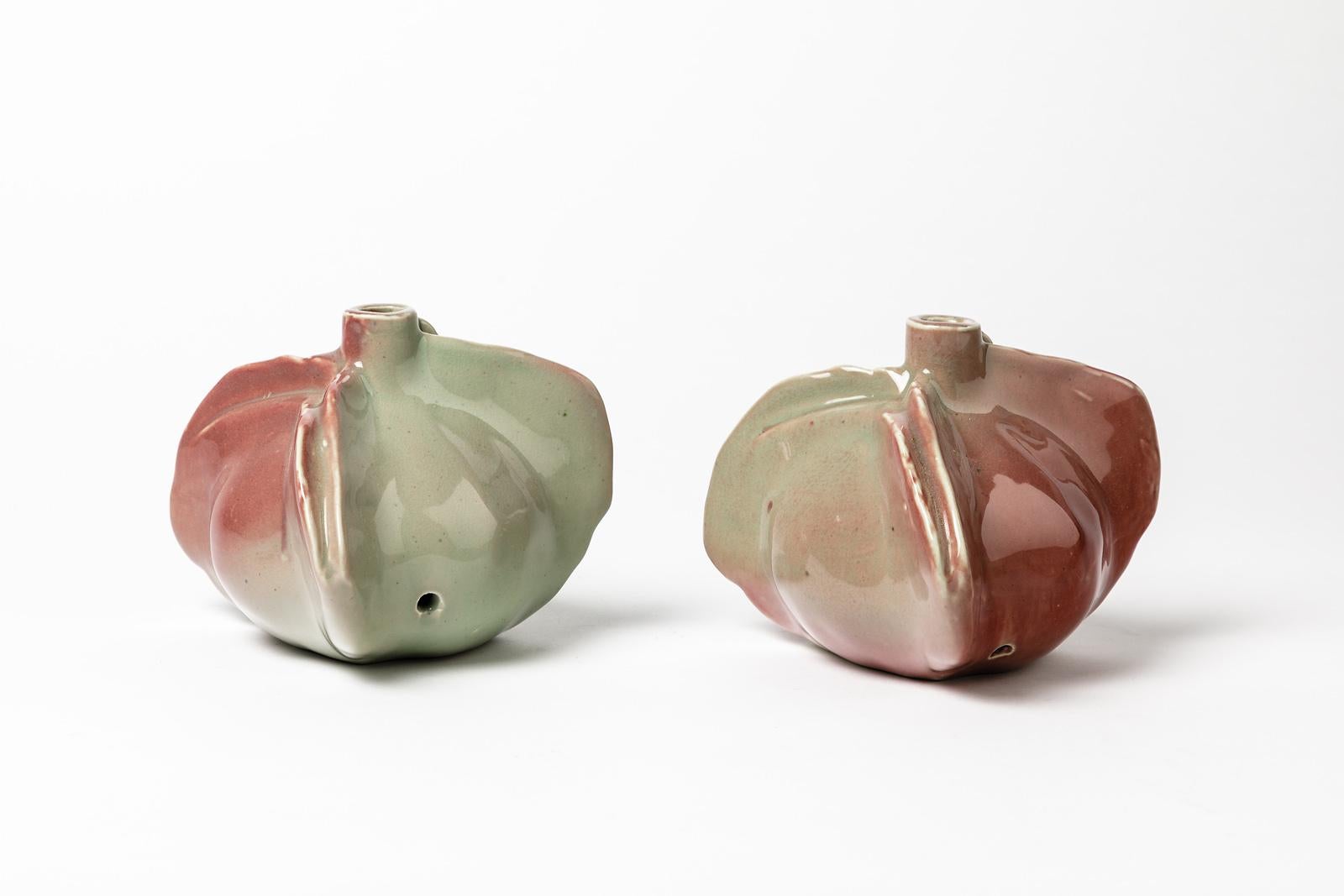 Tim Orr

Élégante paire de lampes de table en porcelaine à base de céramique de Tim Orr.

Couleurs des émaux pour porcelaine verte et rouge

Vendu sans système électrique, uniquement une lampe à base de céramique.

Réalisé vers 1980, signé