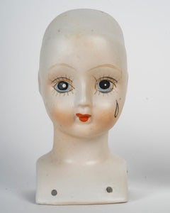 Pair of Porcelain Doll Heads, 1960.