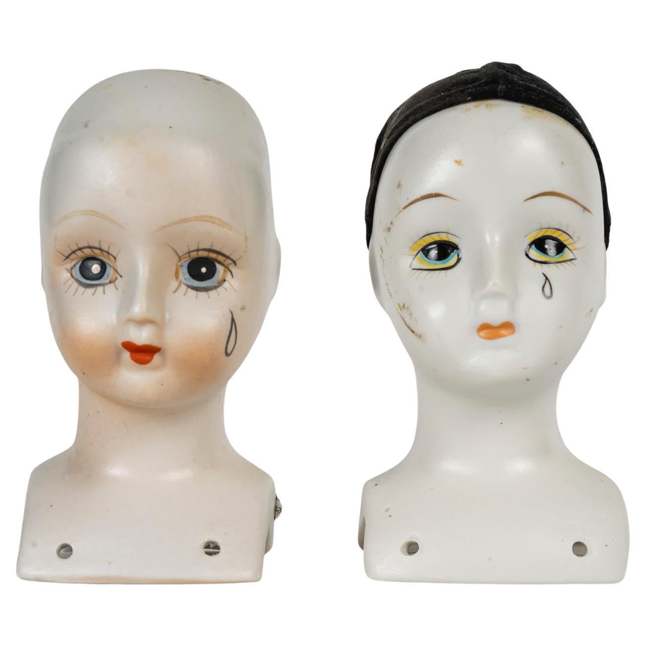 Pareja de cabezas de muñecas de porcelana, 1960. en venta