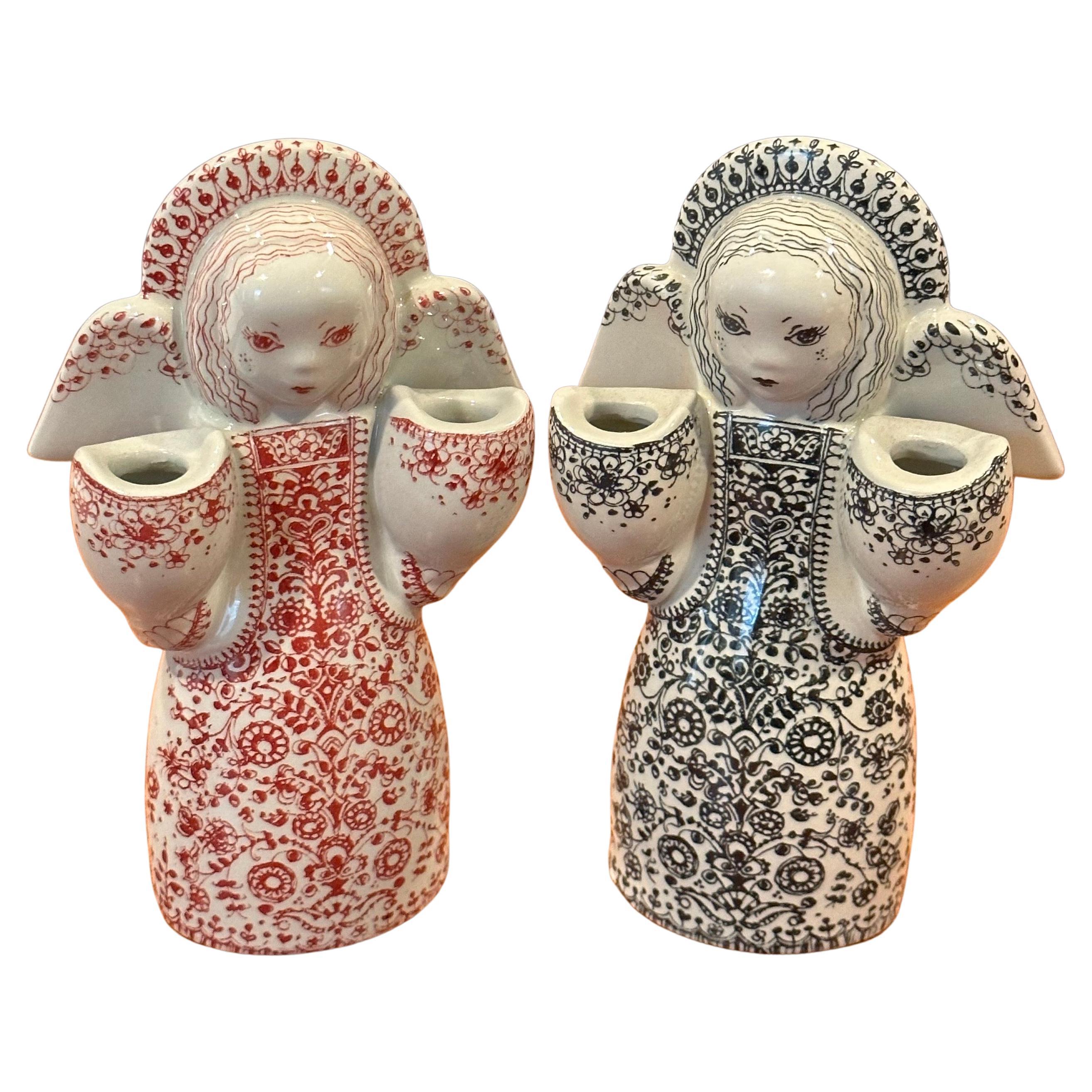 Ein sehr cooles und schwer zu finden Paar Porzellan figurative Dual Kerzenhalter von Nymolle von Denamark, ca. 1960er Jahre.  #3186

Das Paar ist in sehr gutem Vintage-Zustand ohne Chips, Risse oder Sprünge und misst 3,5 