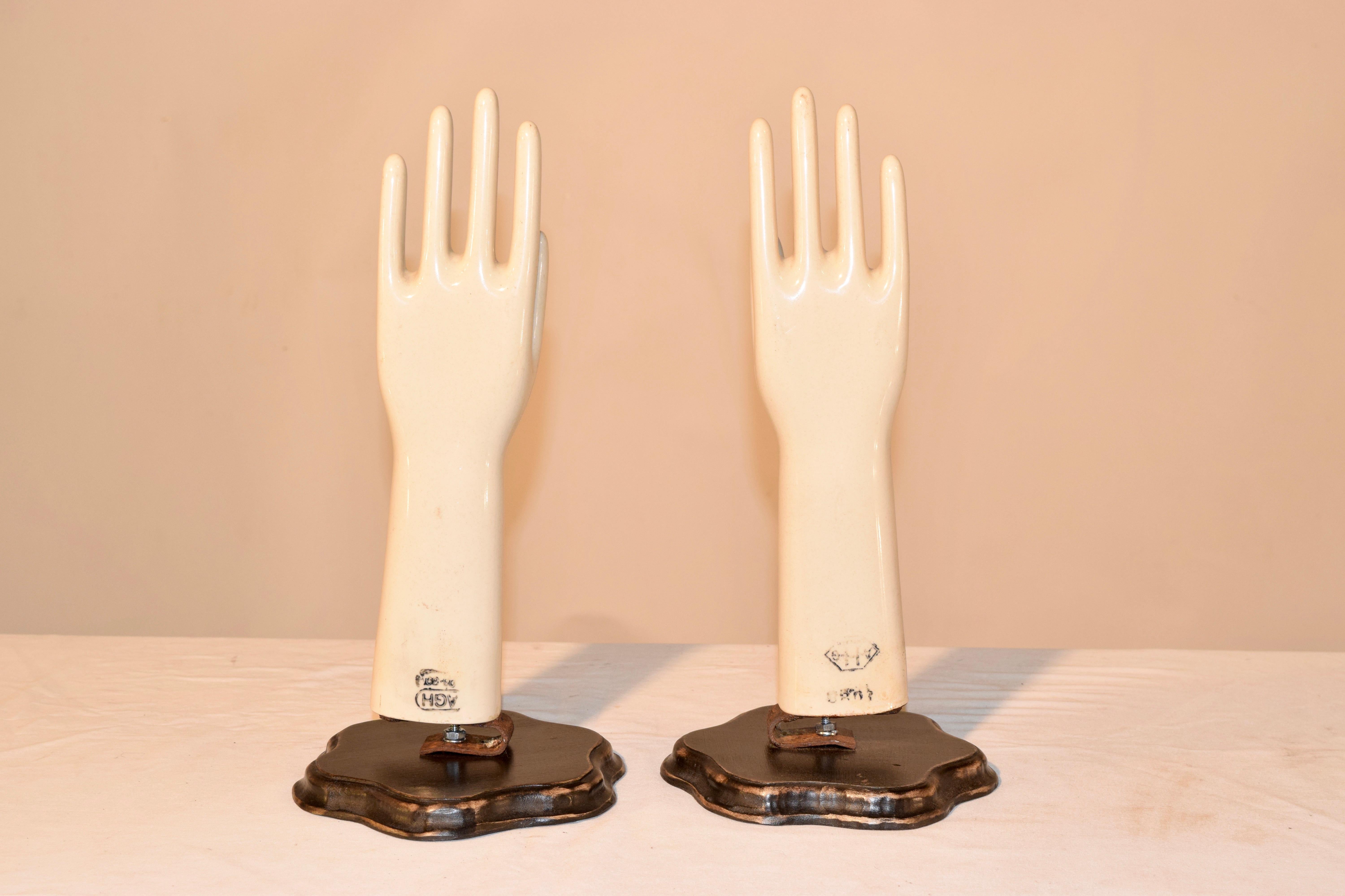 Pair of English porcelain molds for the making of latex gloves. Made from the best ceramics, they were immersed in vats of bubbling liquid latex. They were made by the best porcelain manufacturers worldwide; among which are Rosenthal, Villeroy &