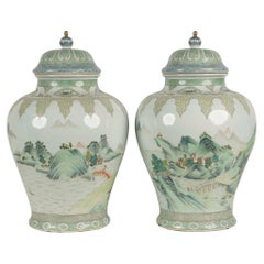 Pareja de jarras de porcelana pintadas a mano al estilo Qian Jiang Cai