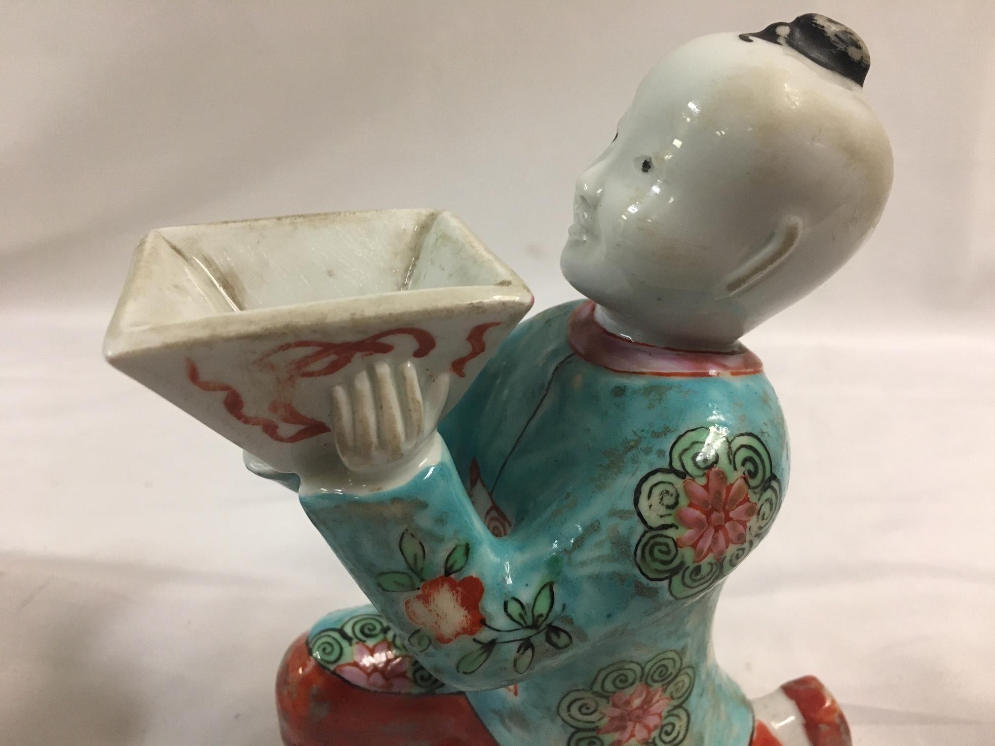 Pair of Porcelain Kneeling Chinese Boys Holding Shallow Single Blossom Vessels For Sale 4