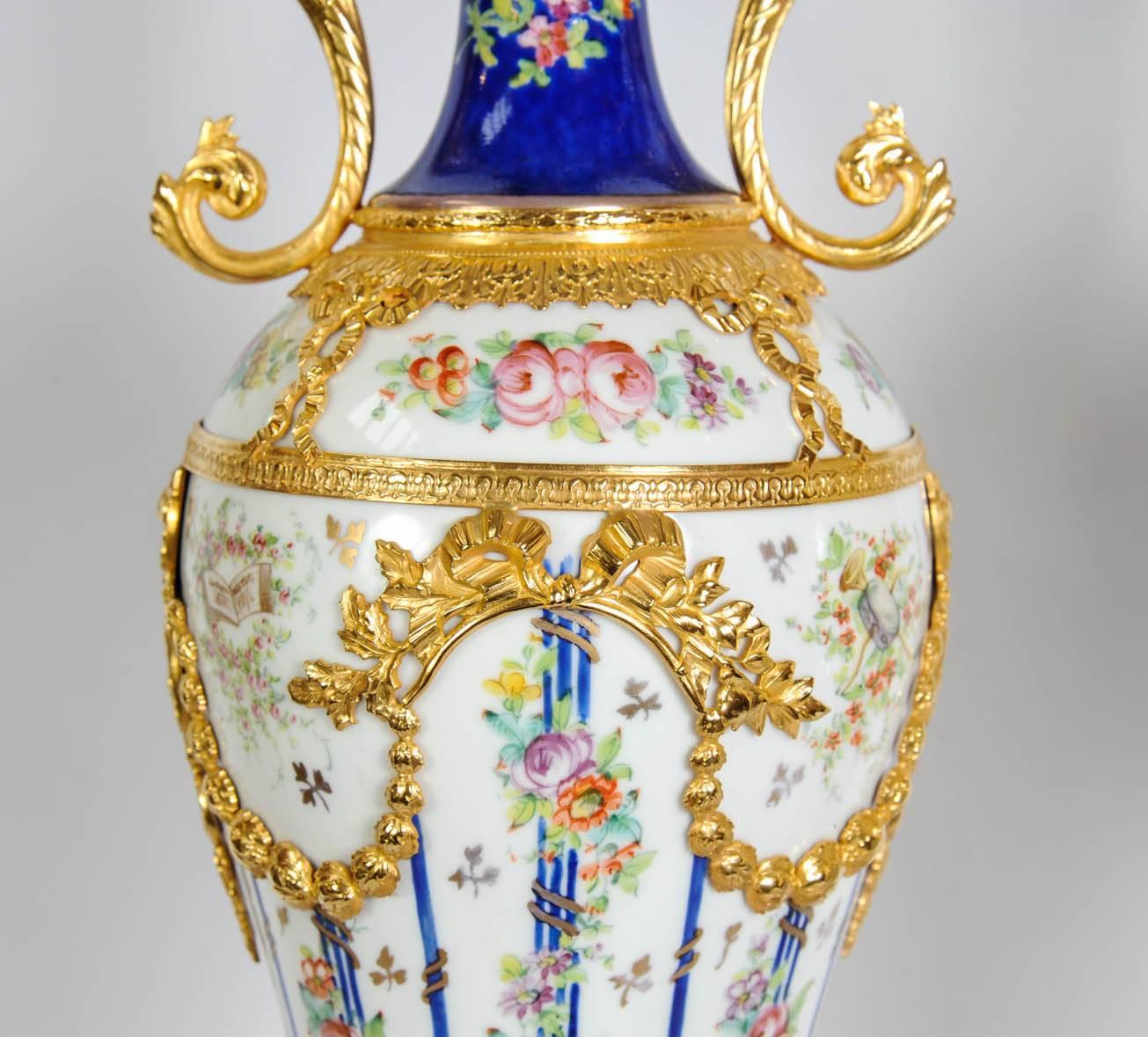 Gilt Pair of Porcelain of Sèvres Vases For Sale